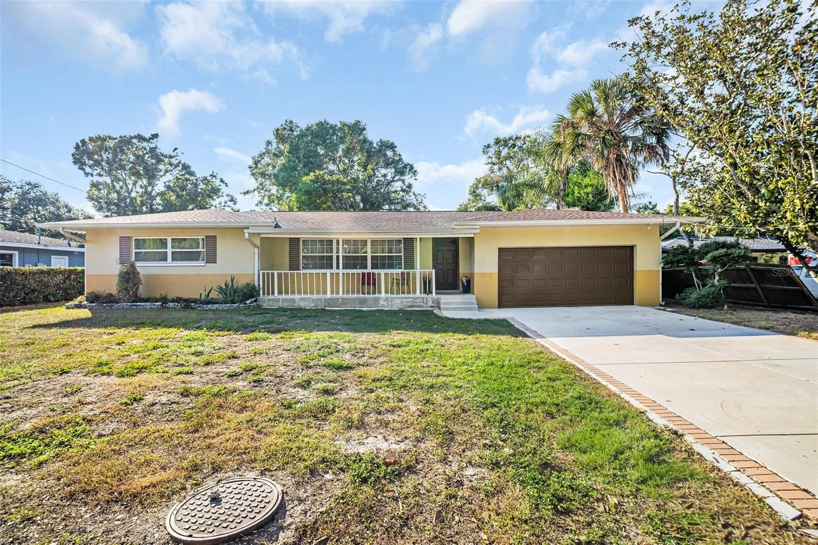 Front View-New Garage door and Driveway - 1182 NORWOOD AVE, CLEARWATER