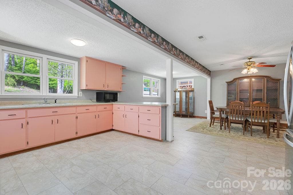 Open Kitchen and Dining Area - 1482 Island Ford Road, Brevard