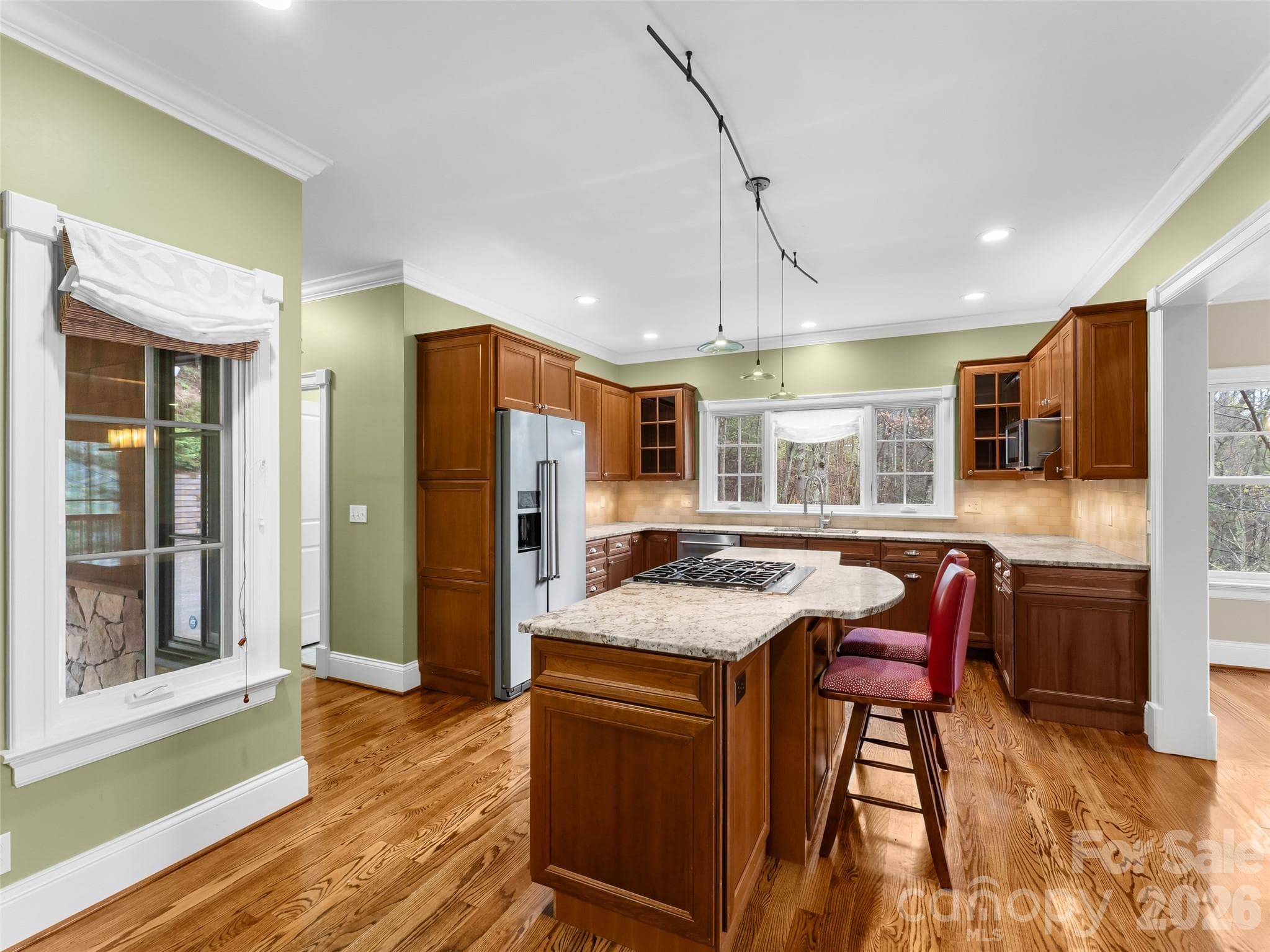 This gourmet kitchen features granite countertops and cherry cabinets. - 5 Stegall Lane, Asheville
