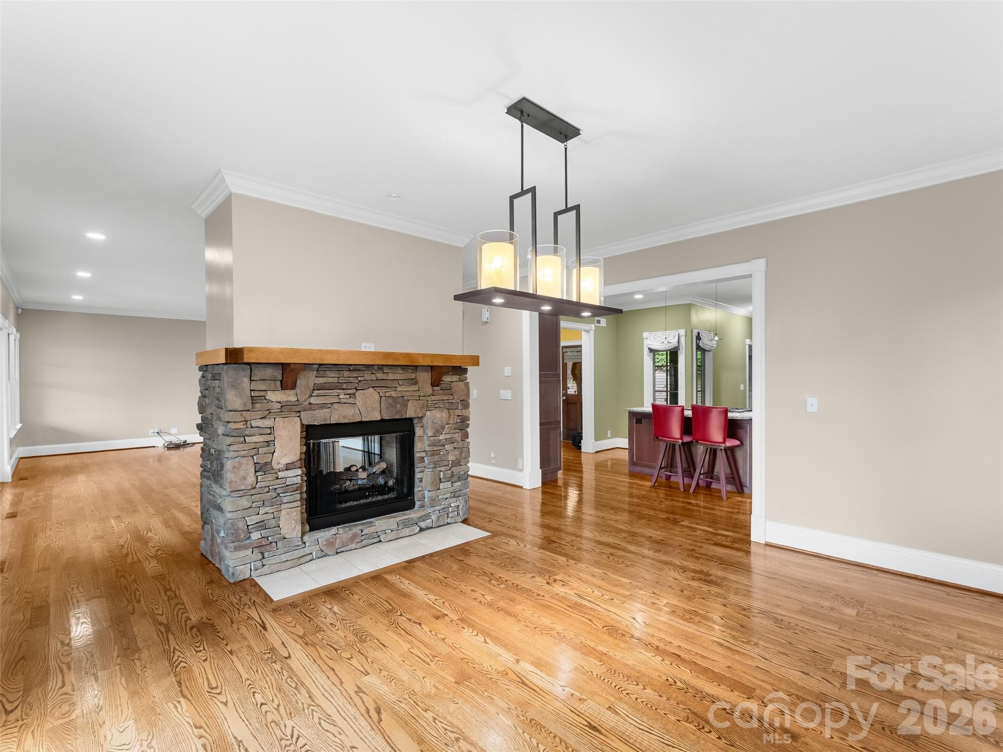 The dining room is open to the kitchen and living room, making it great for entertaining. - 5 Stegall Lane, Asheville