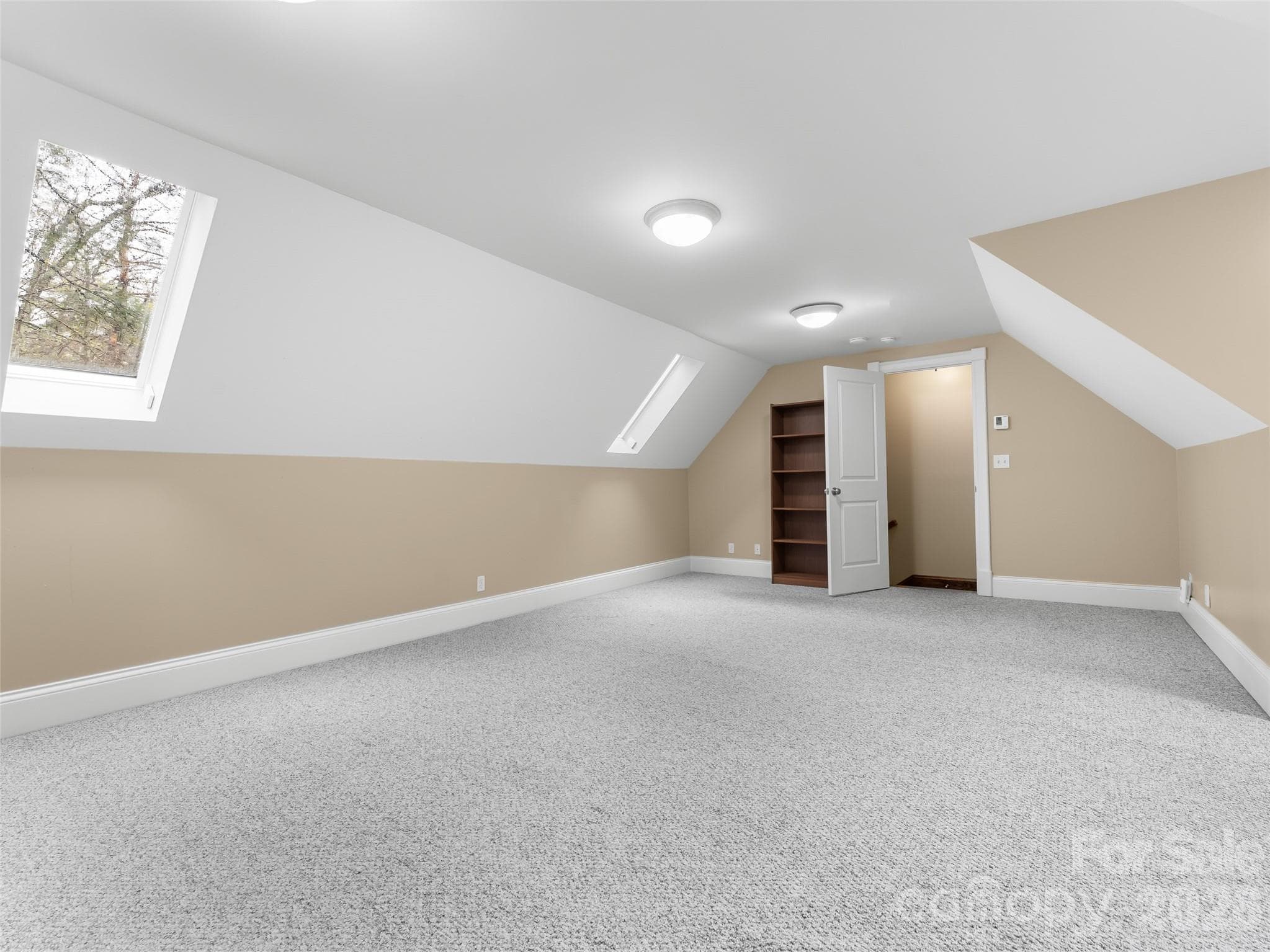 The skylights are able to be opened and closed via remote and offer even more natural light. - 5 Stegall Lane, Asheville