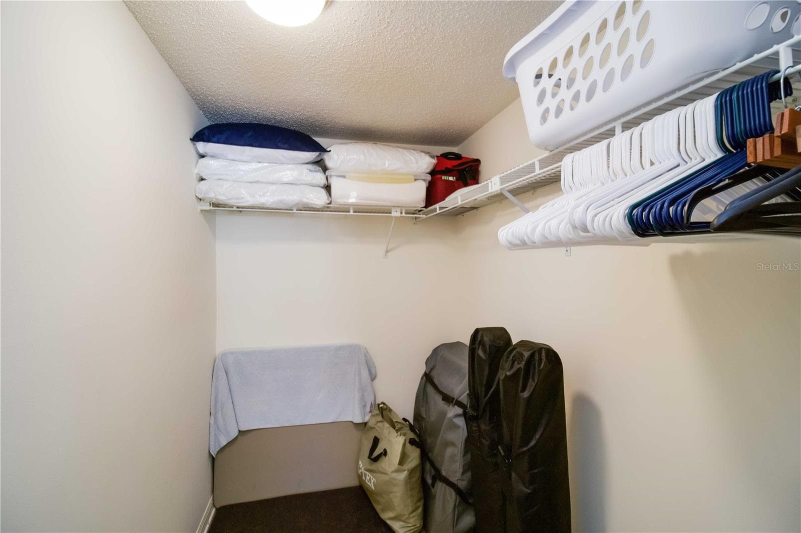 Master bedroom walk-in closet measures approximately 8x5 - 5476 SWIFT RD #19, SARASOTA