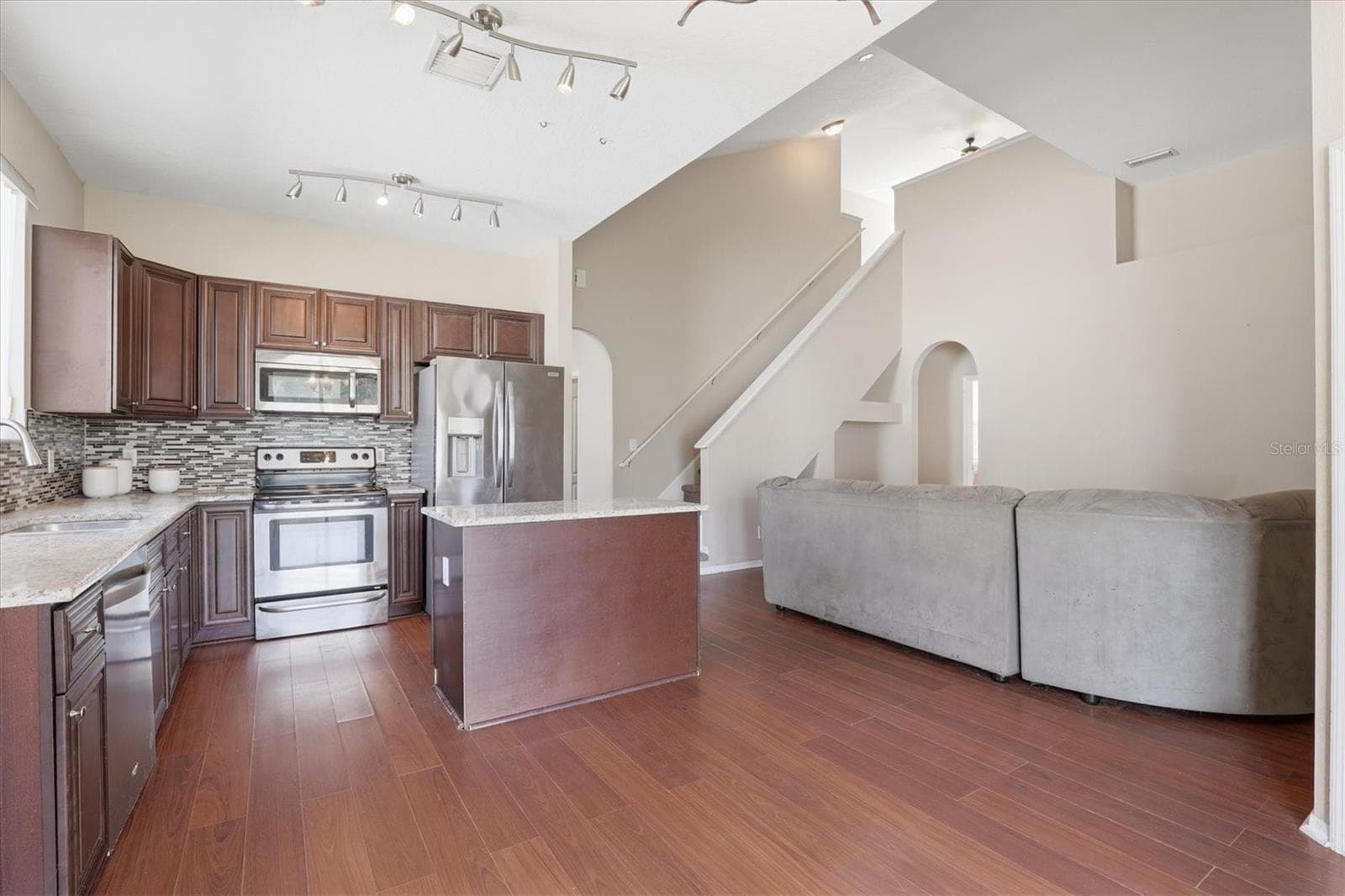 Open Kitchen Concept Overlooking the Family Room - 3036 GIANNA WAY, LAND O LAKES