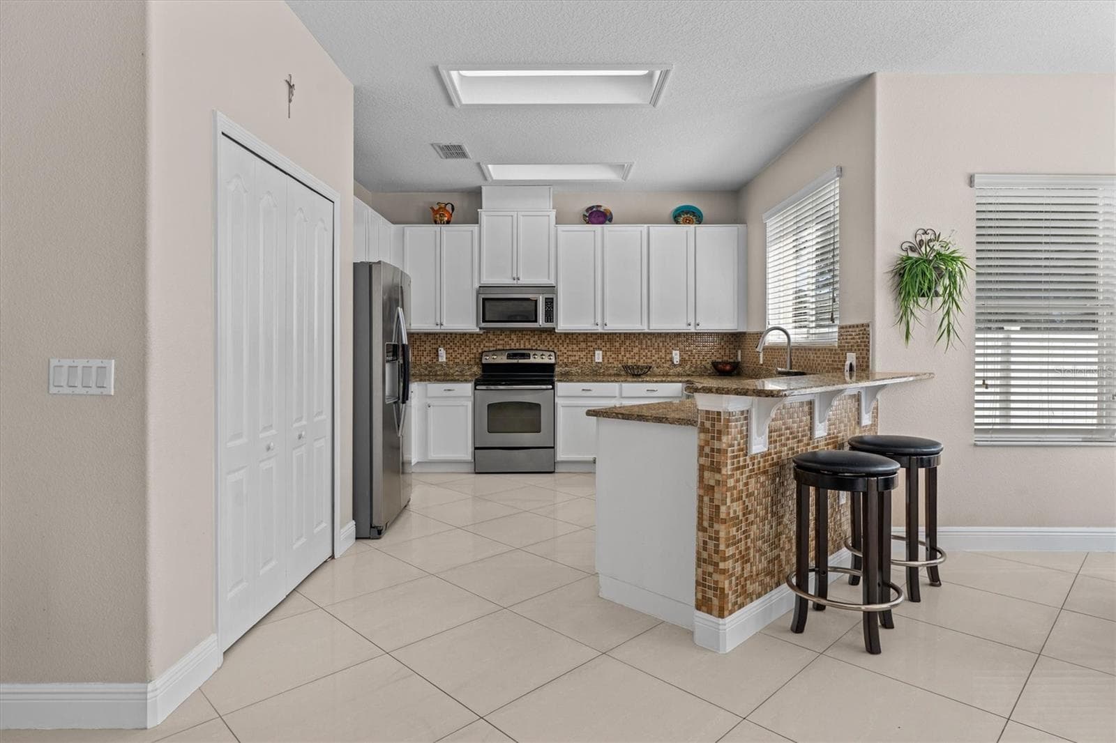 Single Family Residence at 12955 MOSS PARK RIDGE DR, ORLANDO, photo 11 of 43