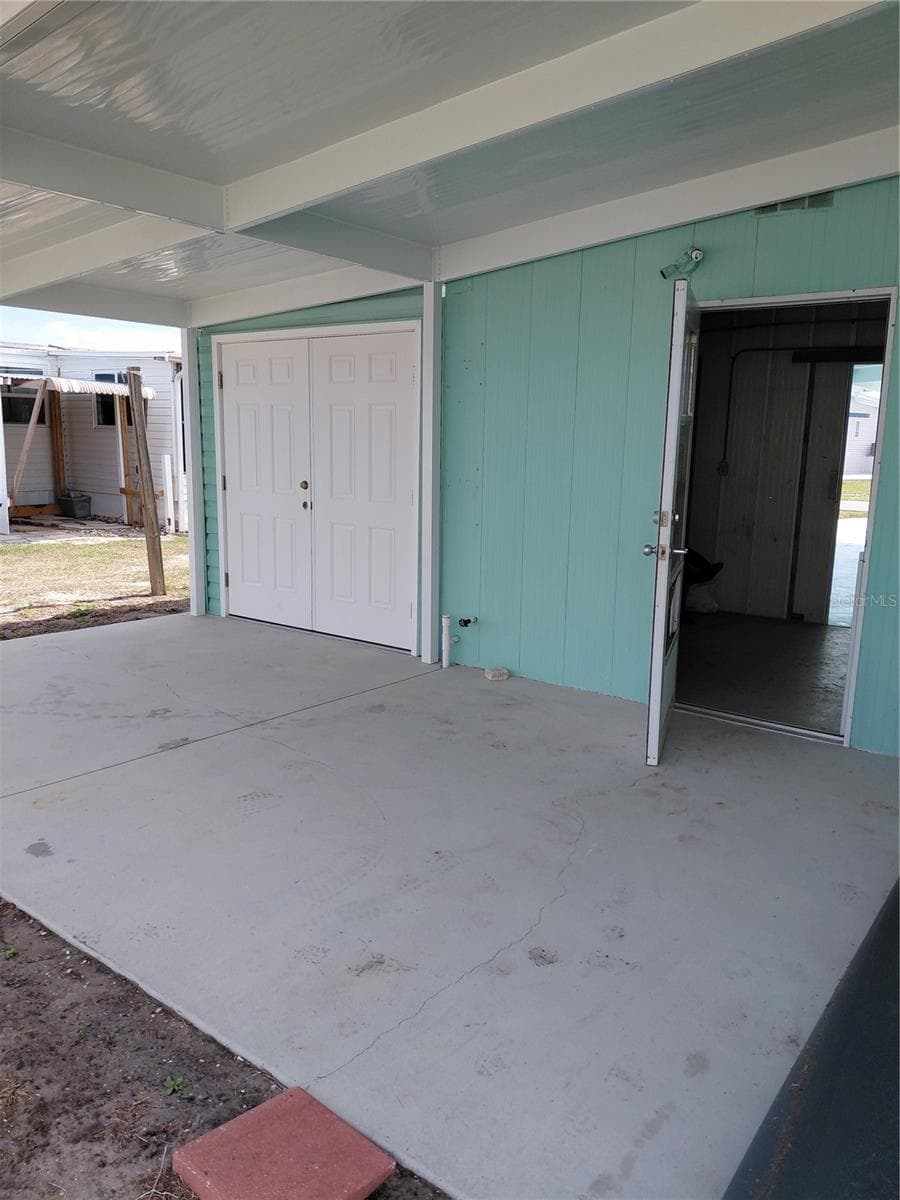 Utility Bldg rear entrance + storage closet - 1451 BLUE HERON DR, ENGLEWOOD