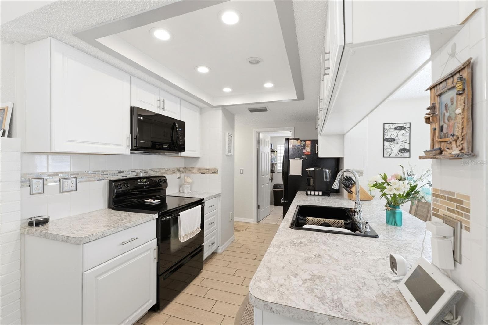 Single Family Residence at 8704 LONG BOAT LN, HUDSON, photo 14 of 33