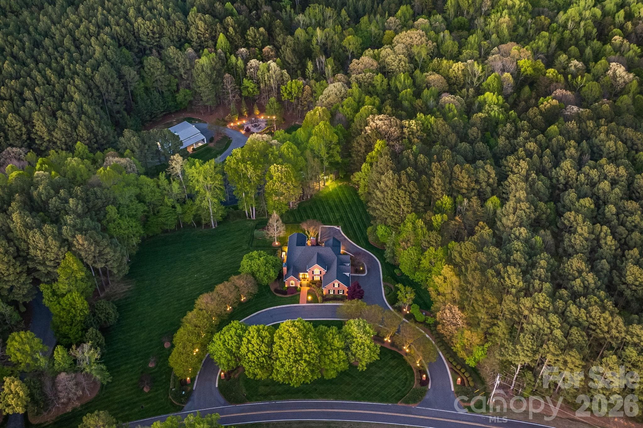 The landscape is professionally, extensively, and beautifully lighted. - Lewisville
