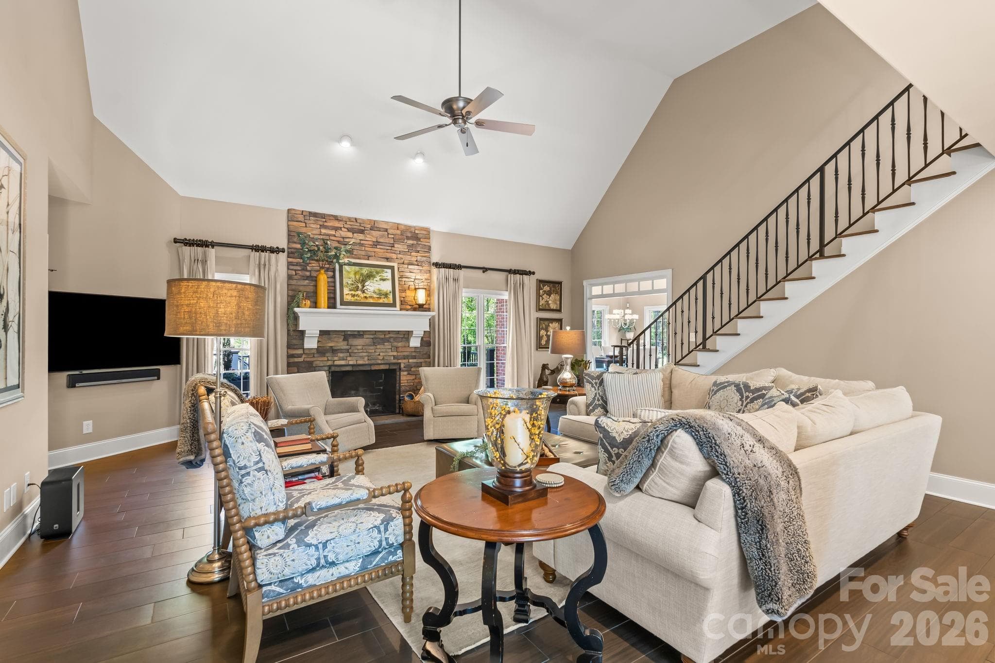 Vaulted ceilings, stone fireplace with gas logs, and custom staircase built in 2014 - Lewisville