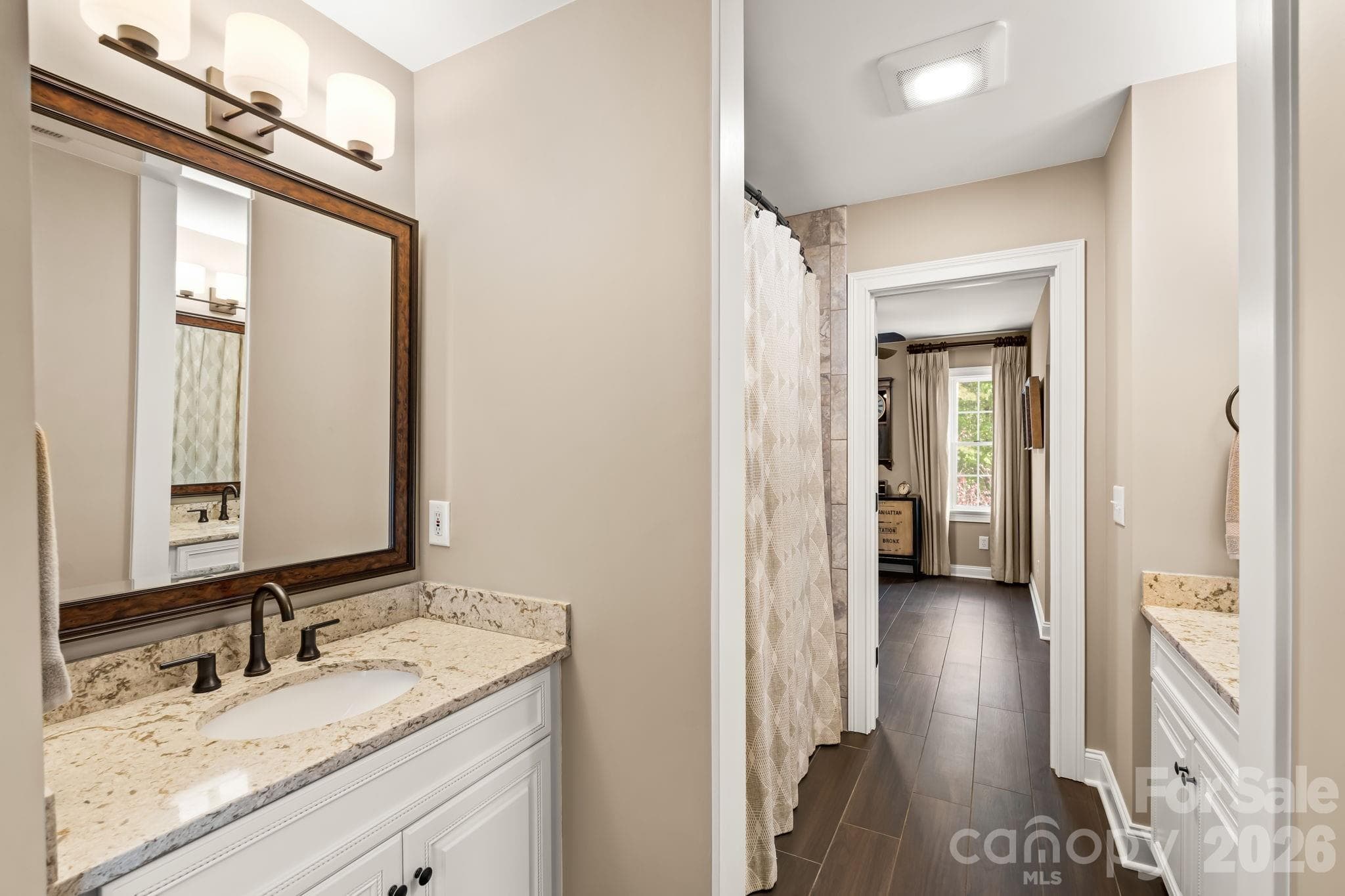 This Jack and Jill bathroom caters to the 4th bedroom and the bonus room - Lewisville