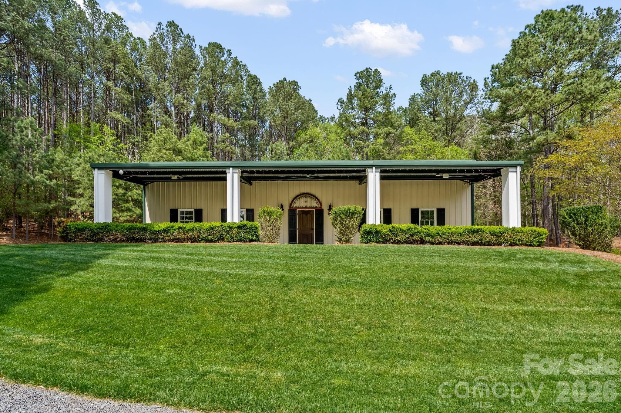 60x40 insulated building with covered patio overlooks the pond - Lewisville