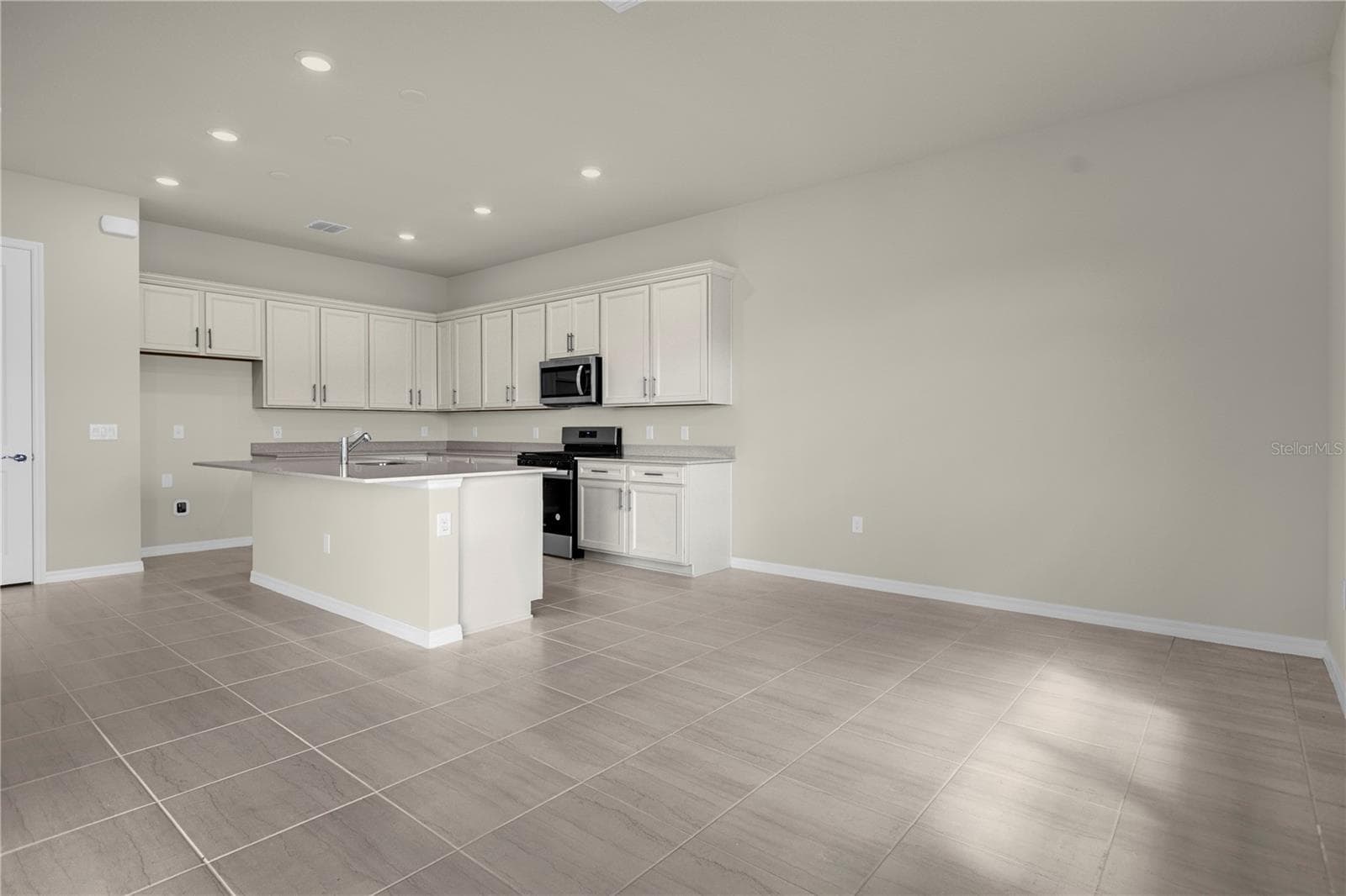 Kitchen from Cafe - 10411 PARK ESTATES AVENUE, ORLANDO