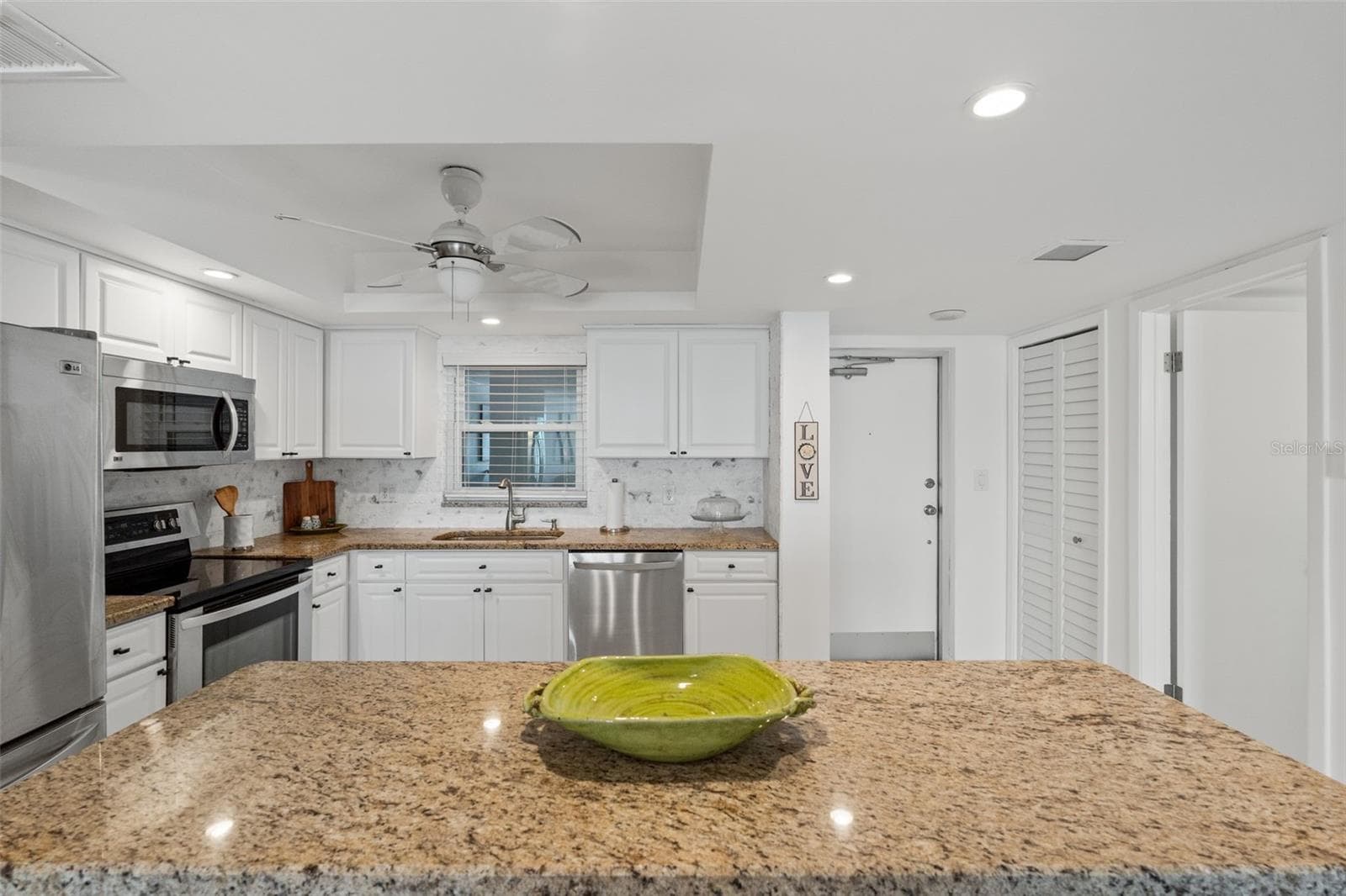 Open Kitchen with Pantry Closet - 5130 BRITTANY DR S #505, ST PETERSBURG