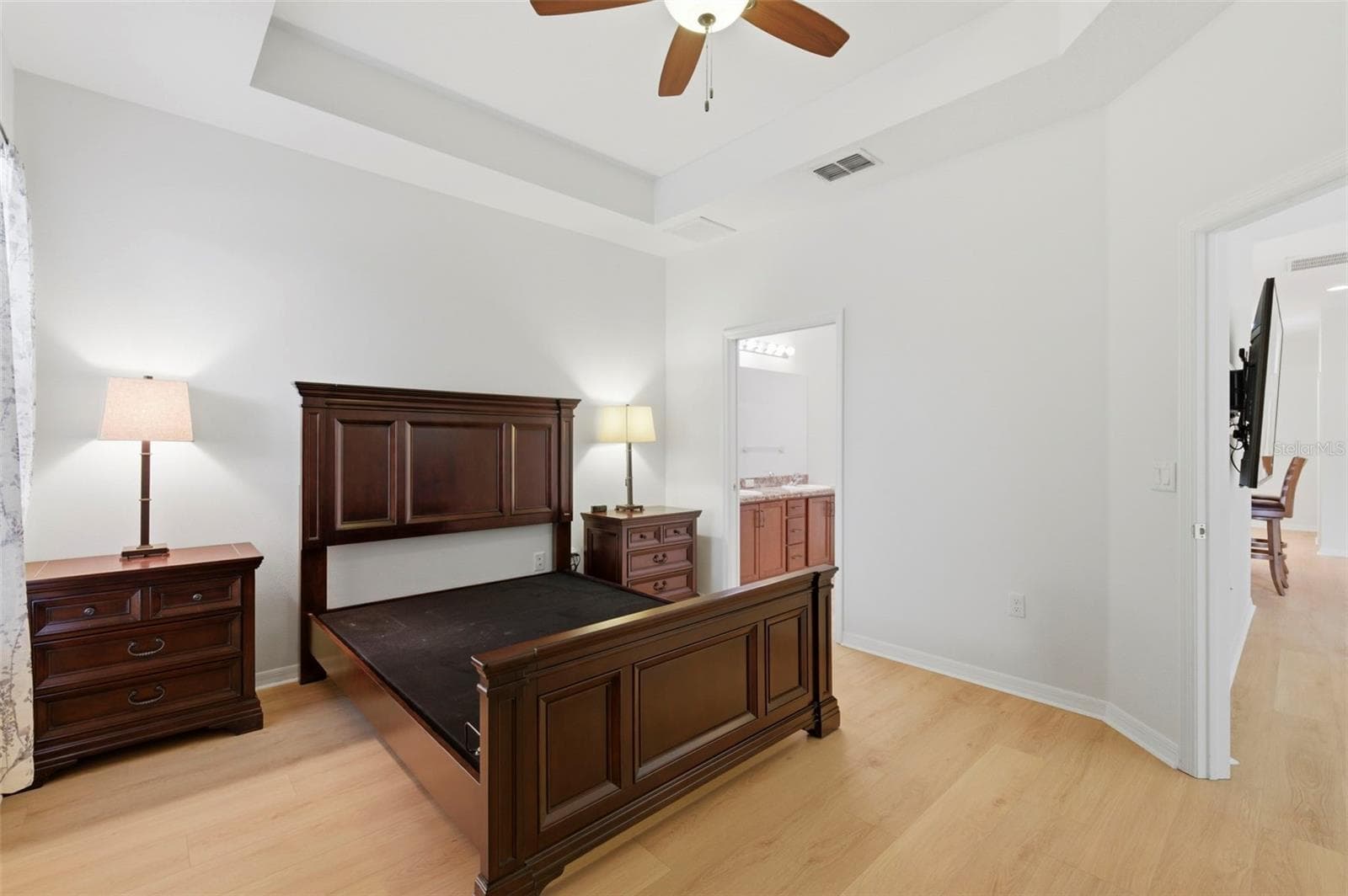 Primary bedroom, located on rear of home. - 11214 PORT DOUGLAS DR, NEW PORT RICHEY