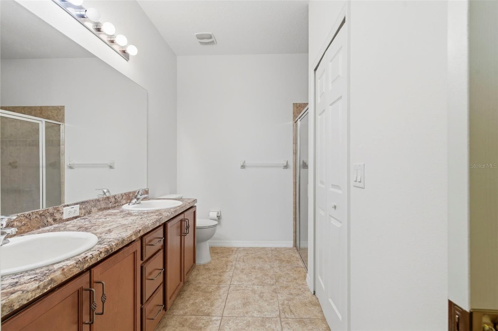 Primary Bathroom and walk-in closet - 11214 PORT DOUGLAS DR, NEW PORT RICHEY