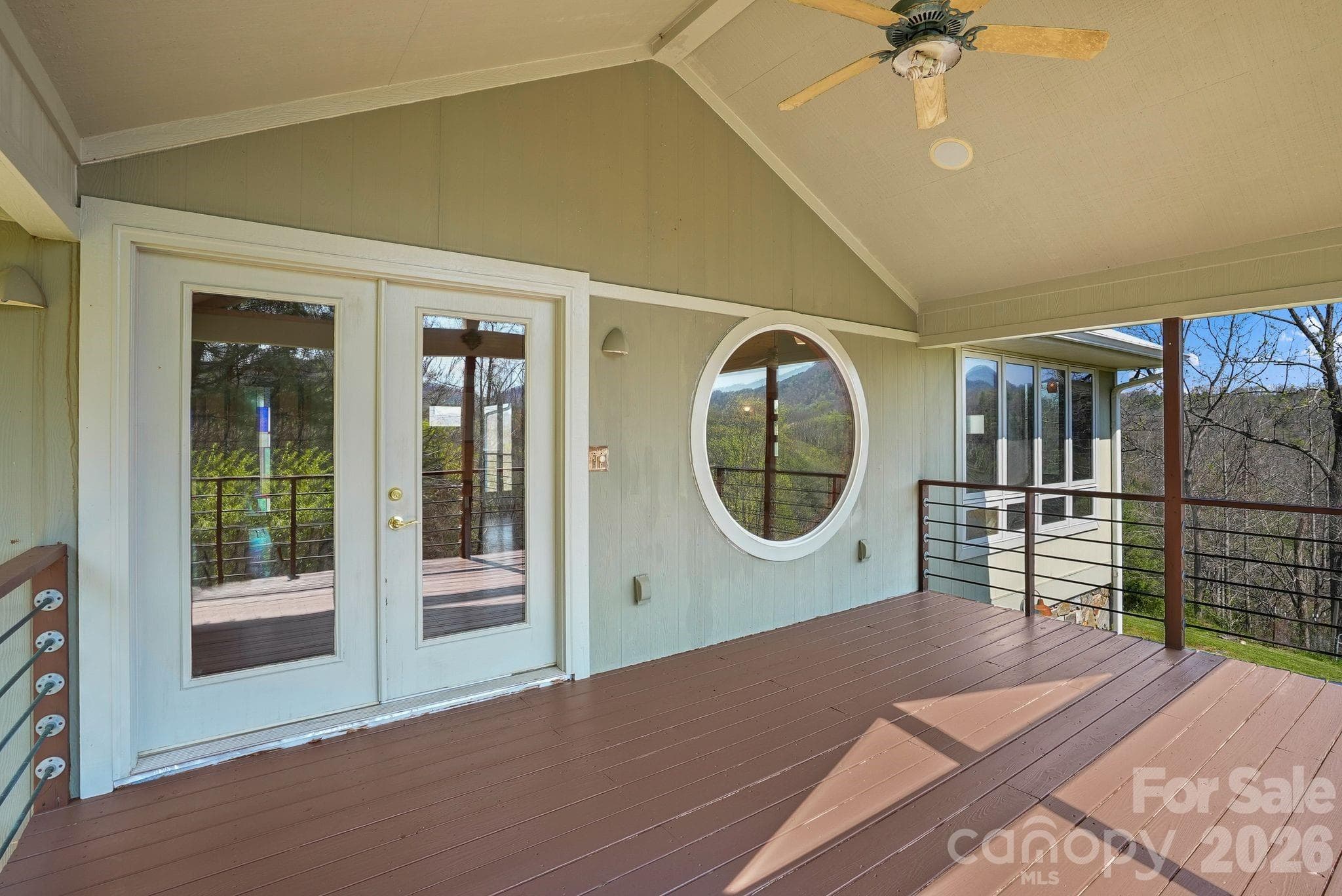 French doors from kitchen to front porch - 310 Burr Ridge, Marshall