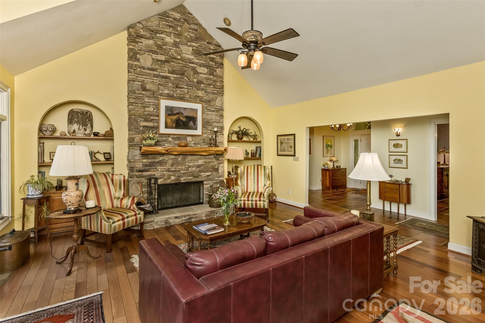 View of Fireplace in living room with Built Ins - 25 Windsong Drive, Fairview