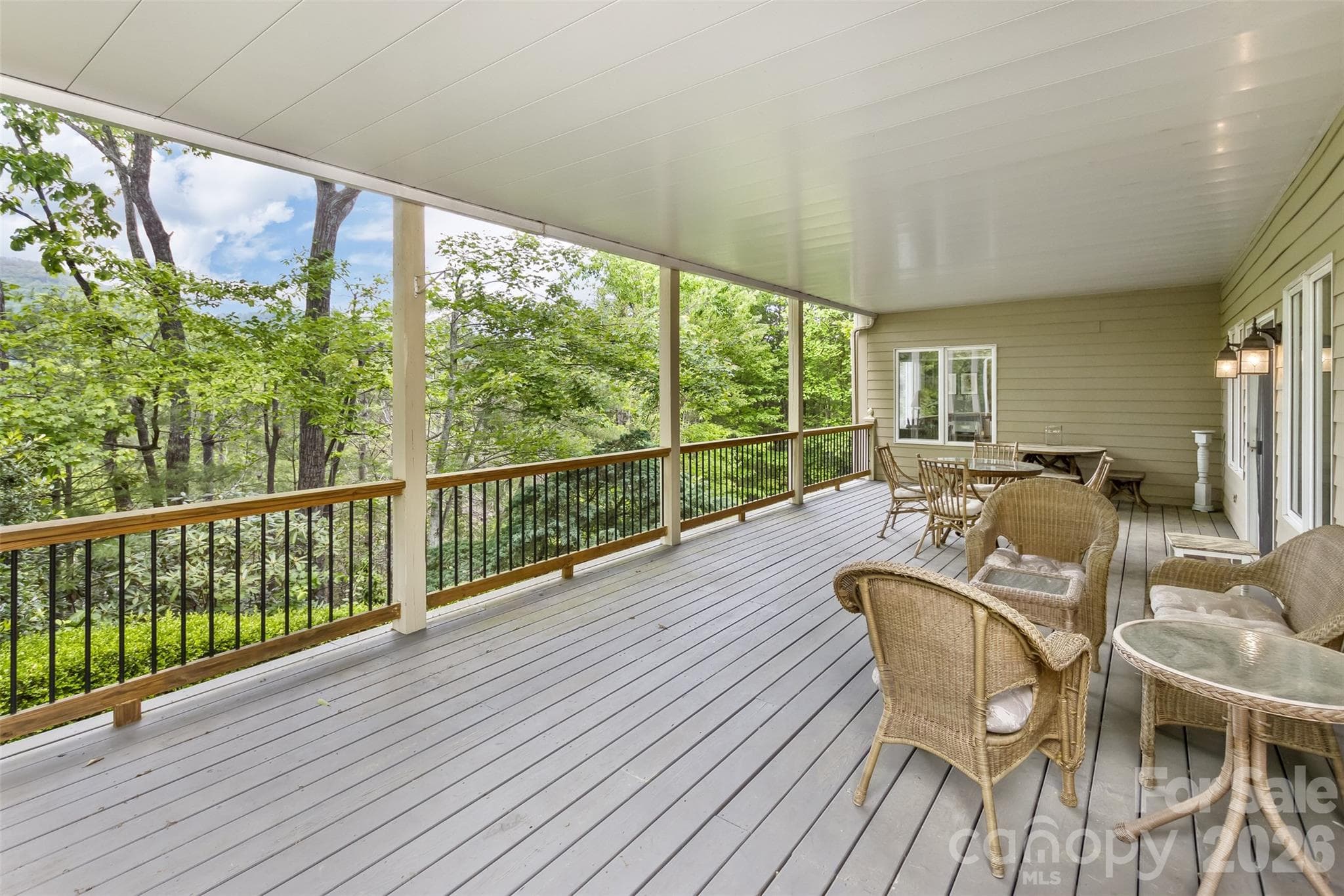 Lower Level Deck is covered and nestled in nature - 25 Windsong Drive, Fairview