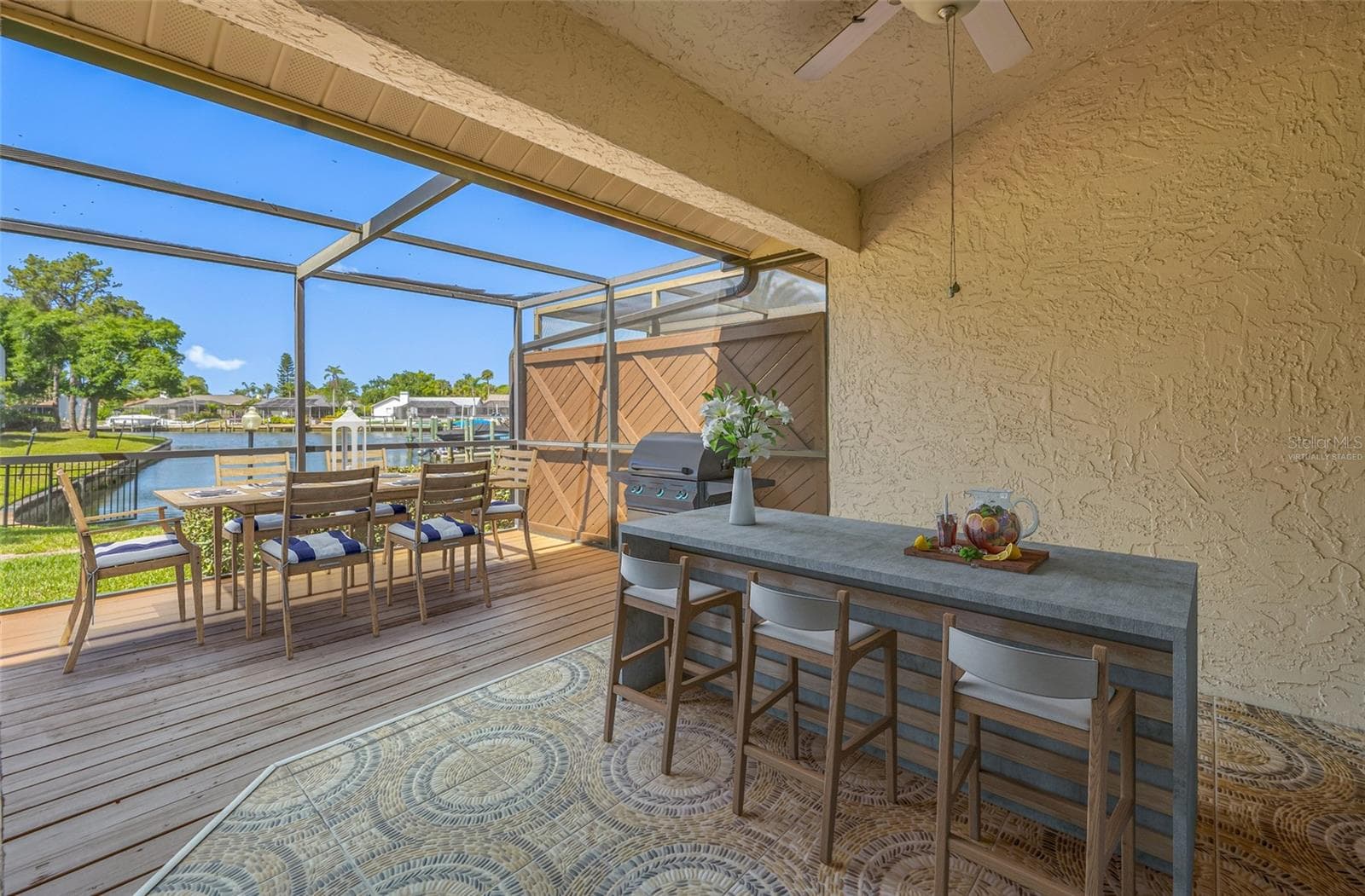 Virtually Staged Screened deck & patio under cover - 10416 SAINT TROPEZ PL, TAMPA