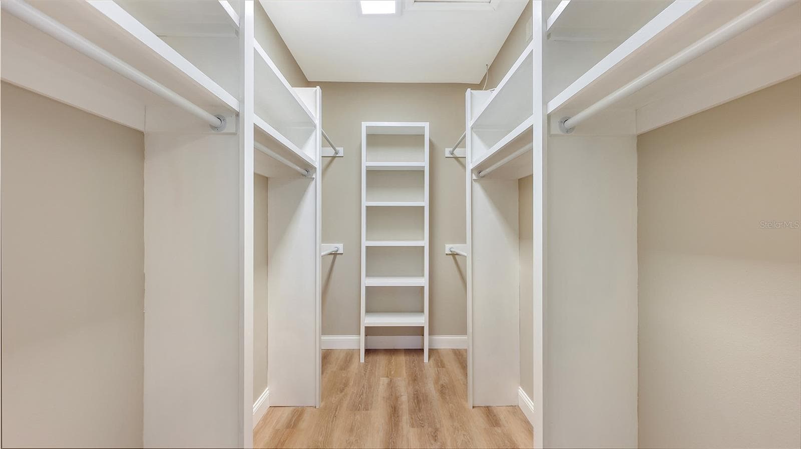 Walk in closet with built ins - 6716 SPRING MOSS PL, LAKEWOOD RANCH