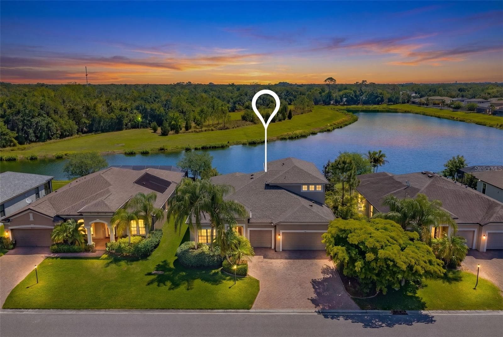 Aerial front of the home twilight - 835 129TH ST NE, BRADENTON