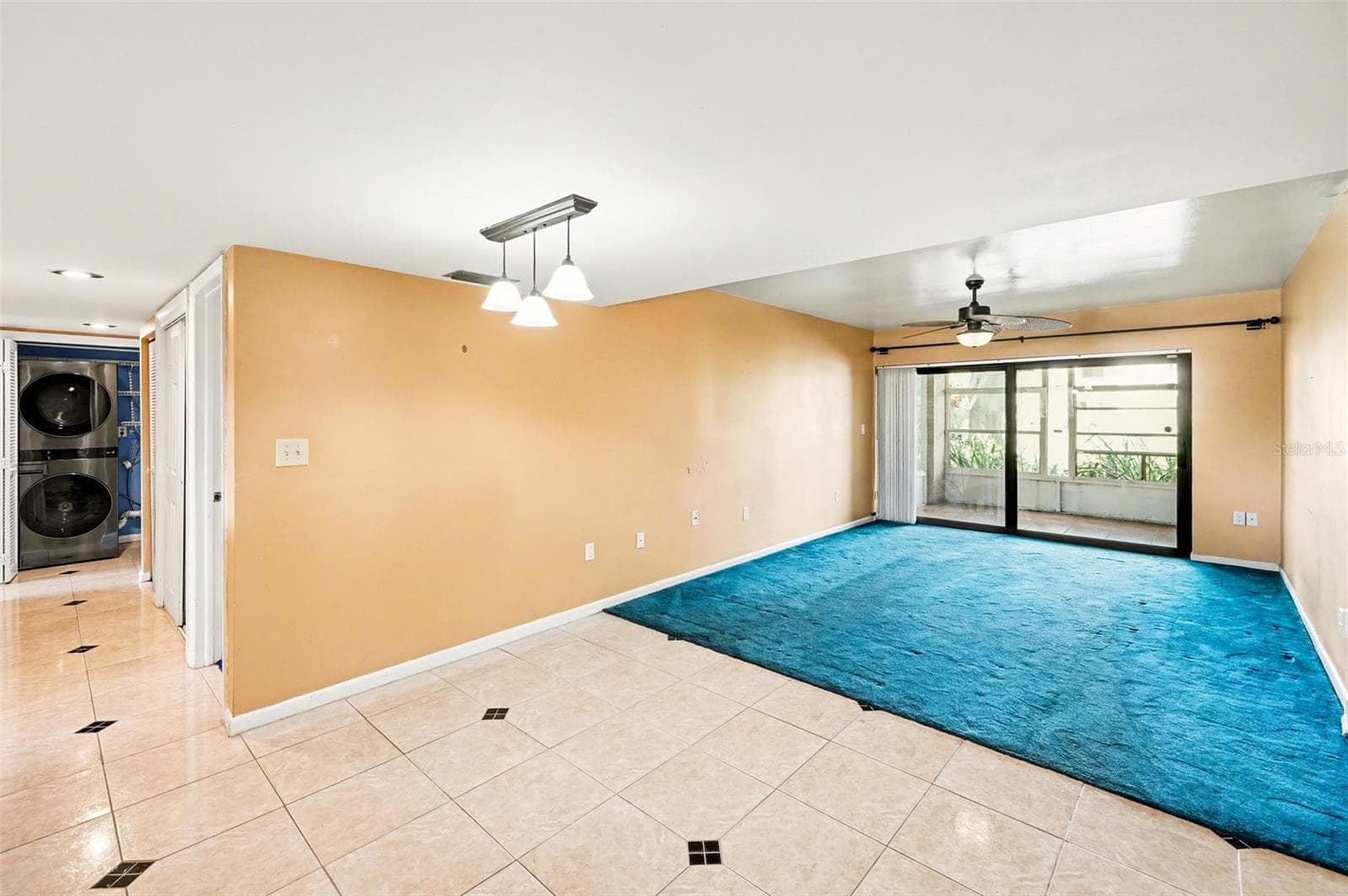 Living/Dining areas (from front entry) - 10755 VILLAGE CLUB CIR N #101, ST PETERSBURG