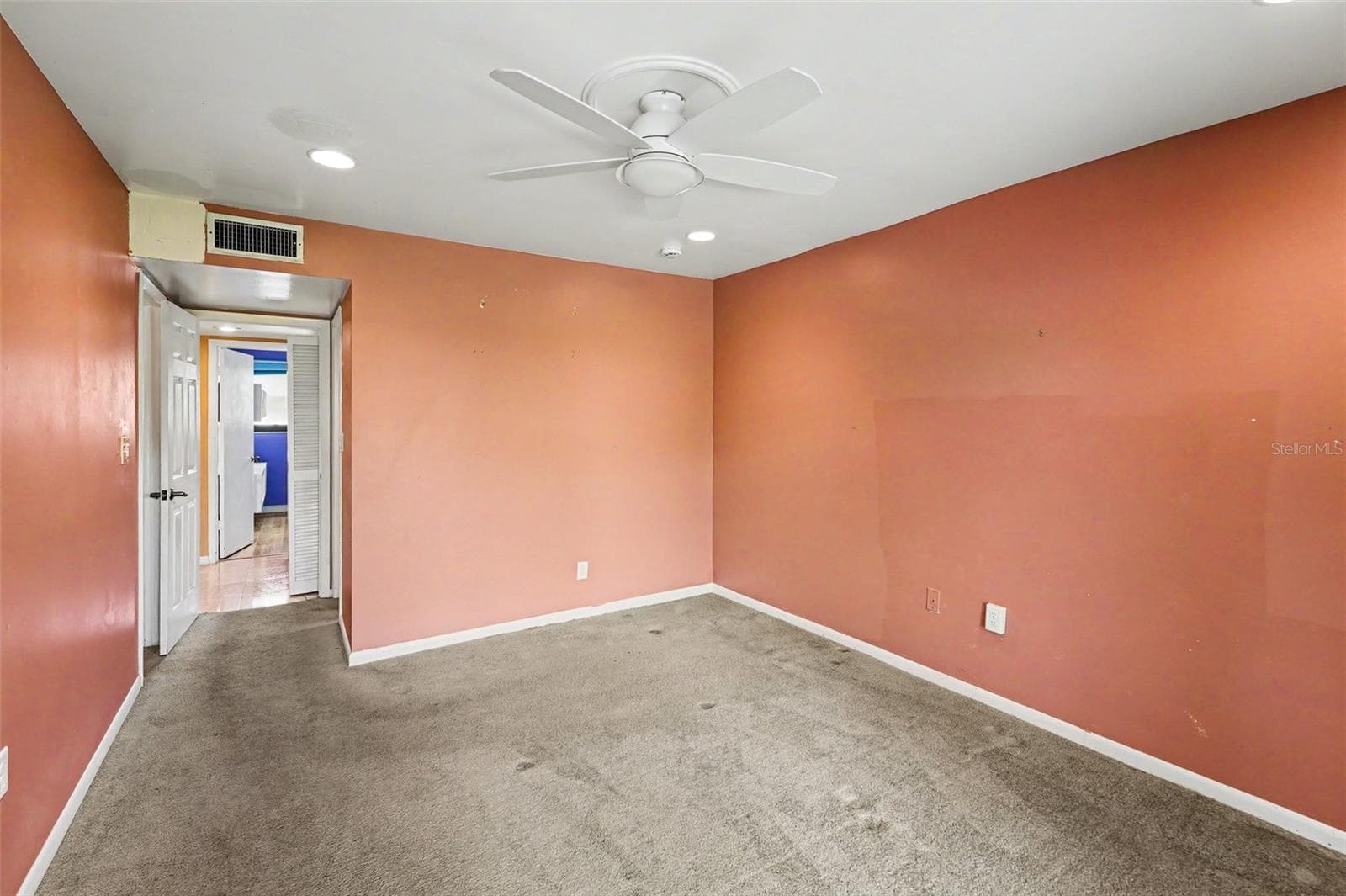 Master Bedroom towards En Suite - 10755 VILLAGE CLUB CIR N #101, ST PETERSBURG