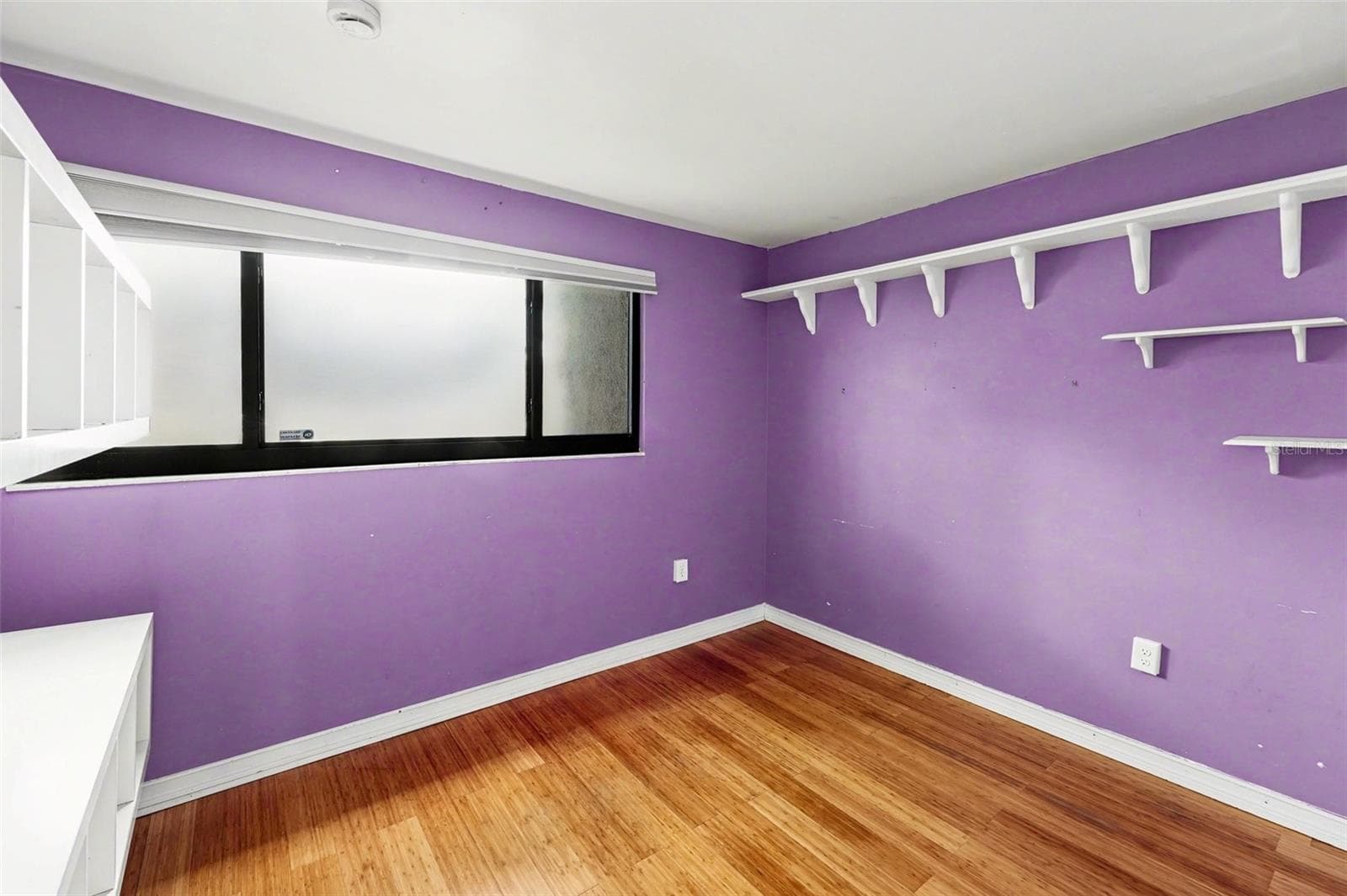 Bedroom 3 (High impact resistant window, New Blinds, mounted shelves) - 10755 VILLAGE CLUB CIR N #101, ST PETERSBURG