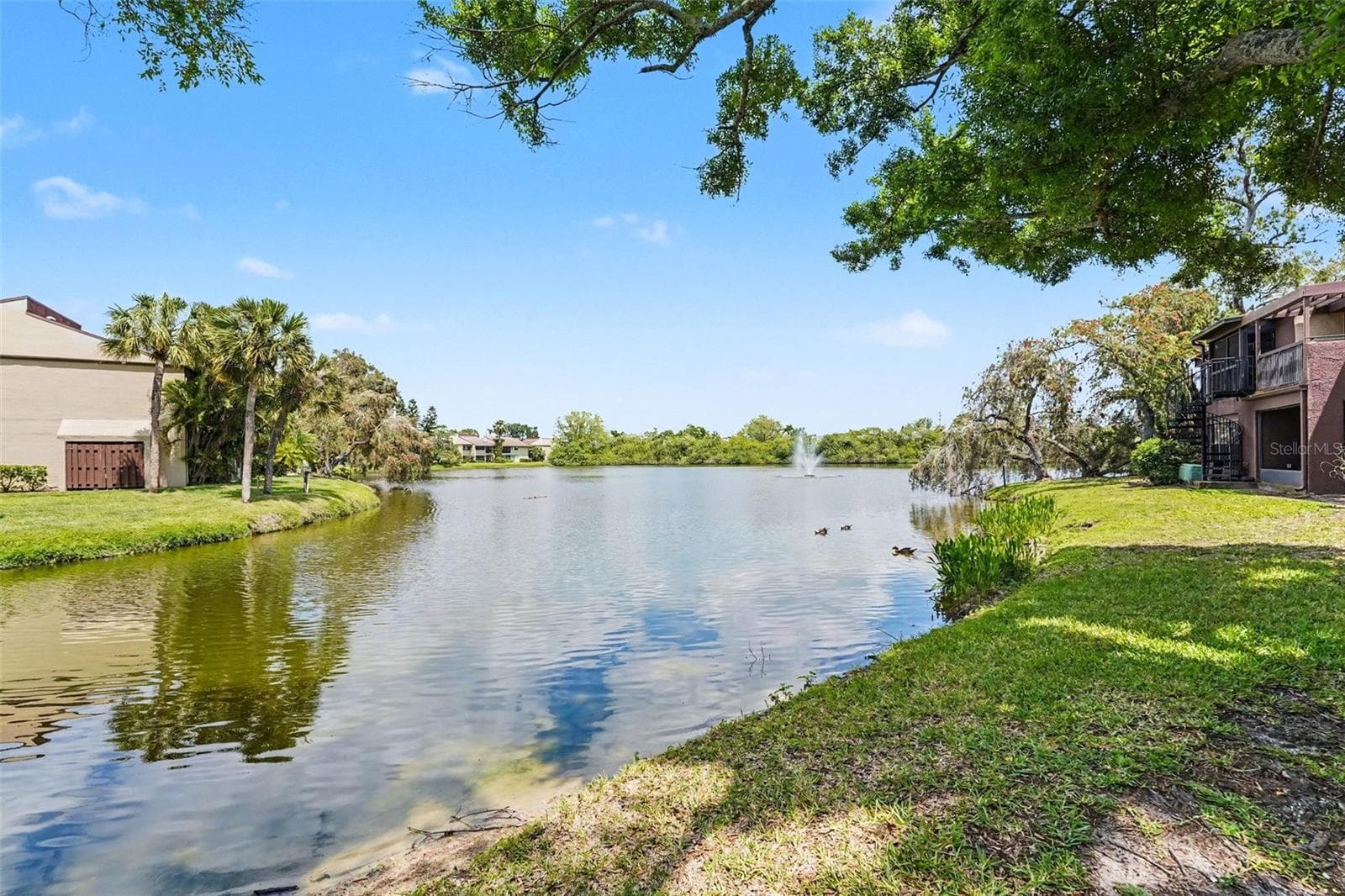 Water View from back patio - 10755 VILLAGE CLUB CIR N #101, ST PETERSBURG
