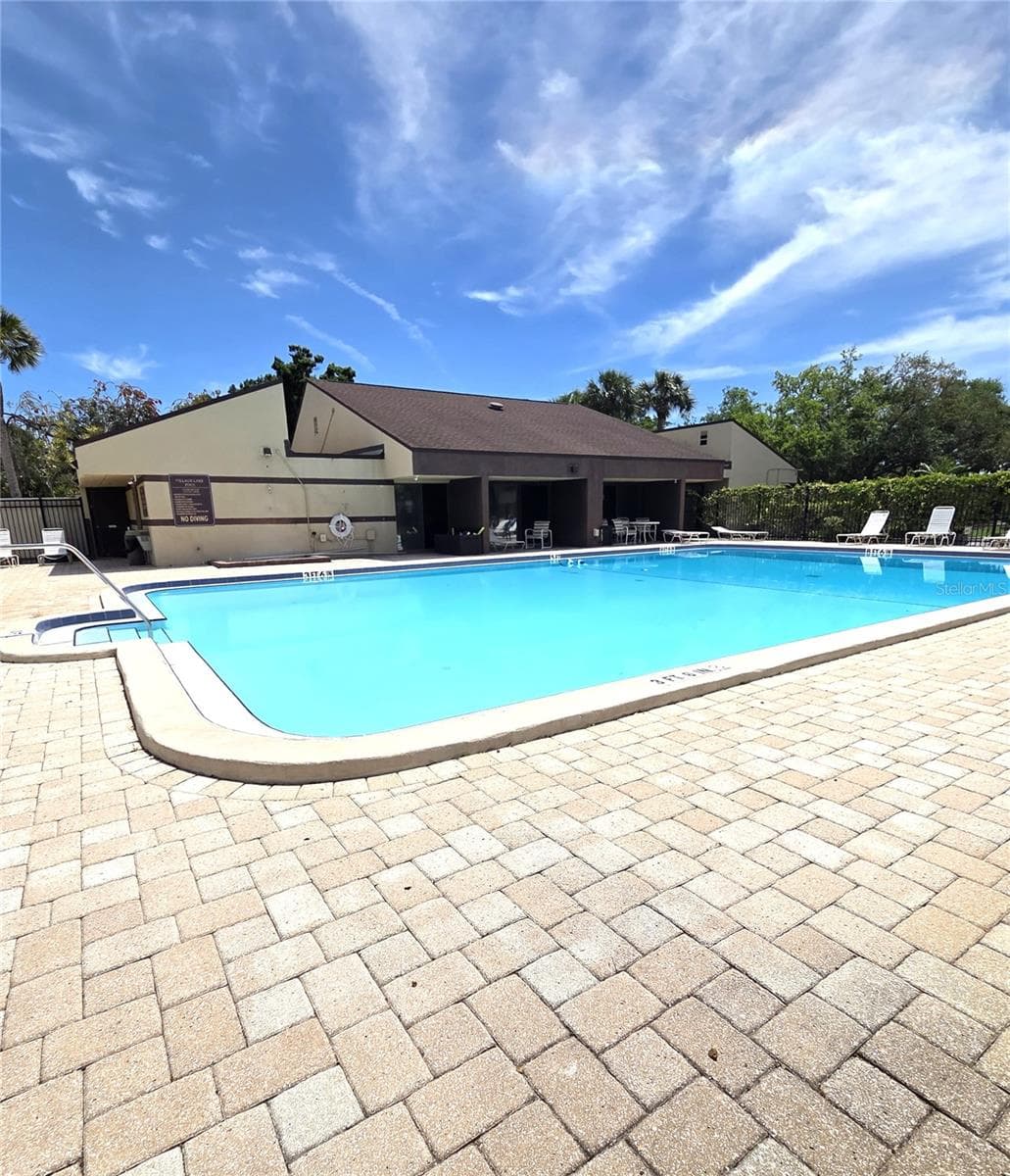 Community Pool and Club House. - 10755 VILLAGE CLUB CIR N #101, ST PETERSBURG