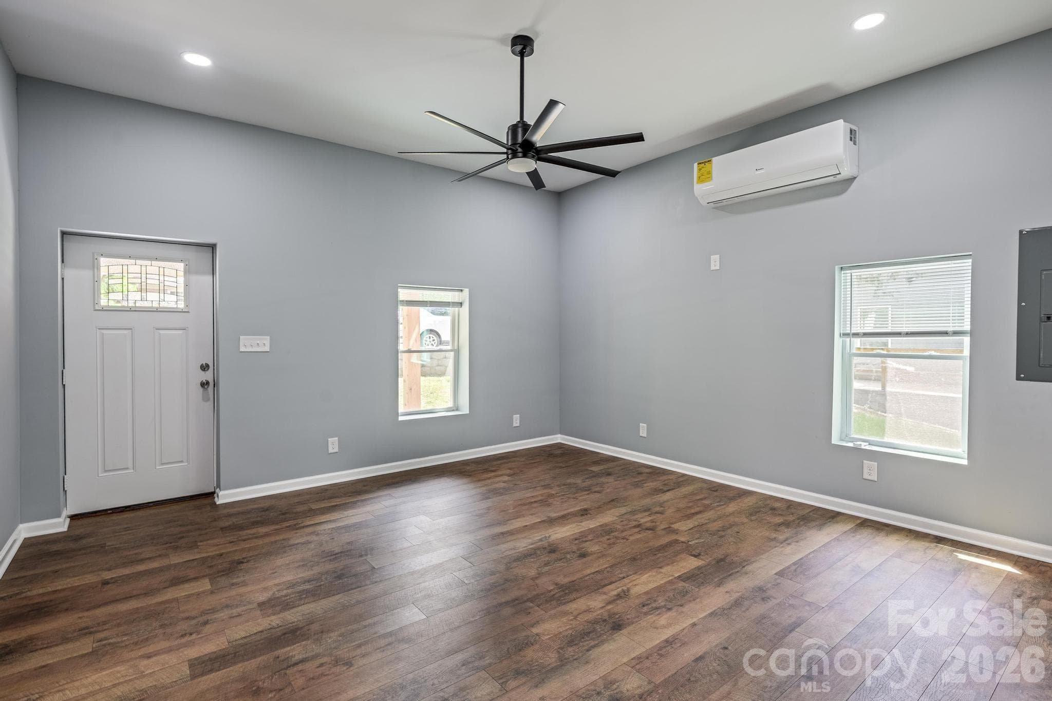 Great Room w/New Flooring & Ceiling Fan - 19513 Meridian Street, Cornelius