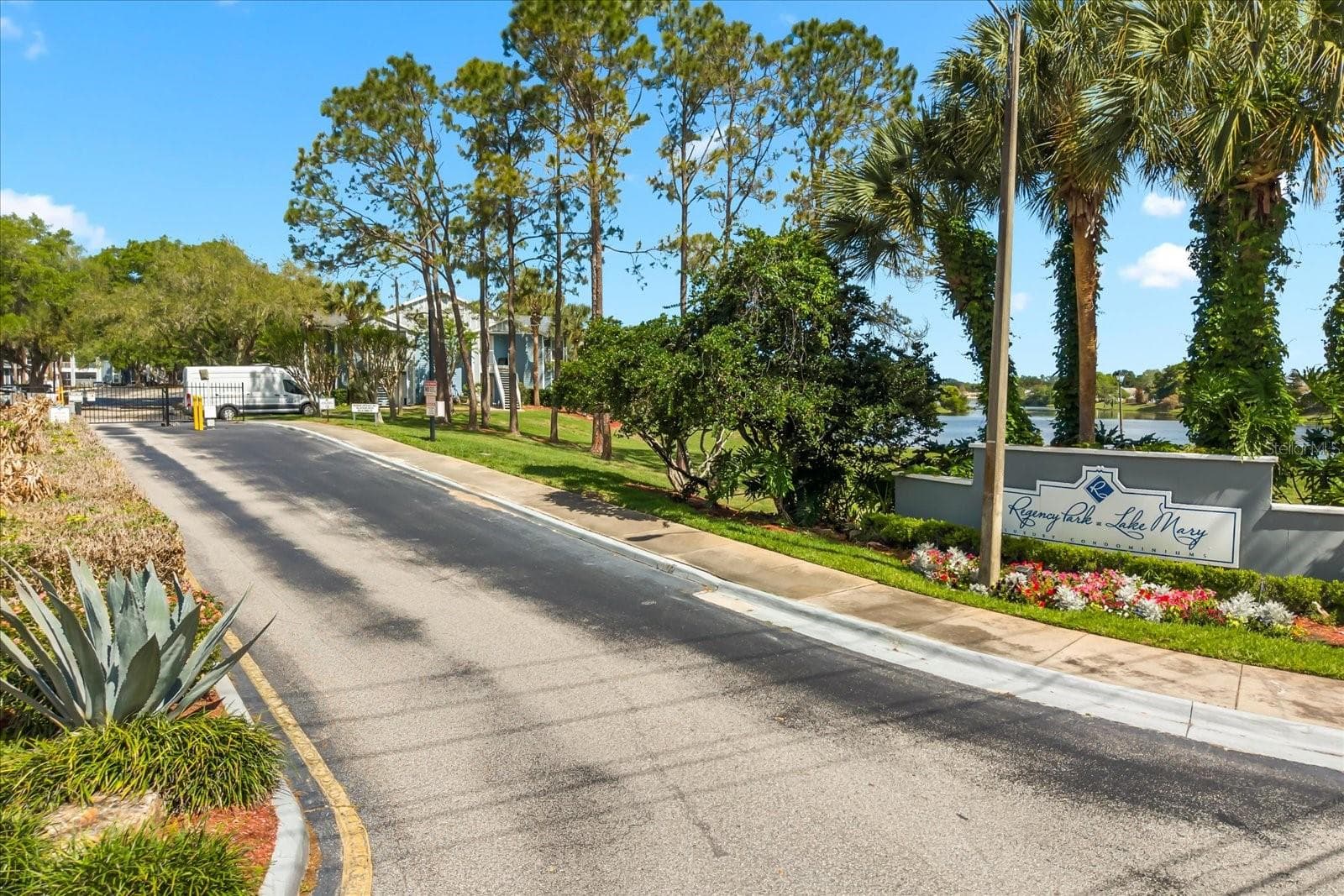 Second gated entrance into Regency Park. Unit is located in building 35 next to gate, convenient for entering and leaving the community. - 2501 GRASSY POINT DR #103, LAKE MARY