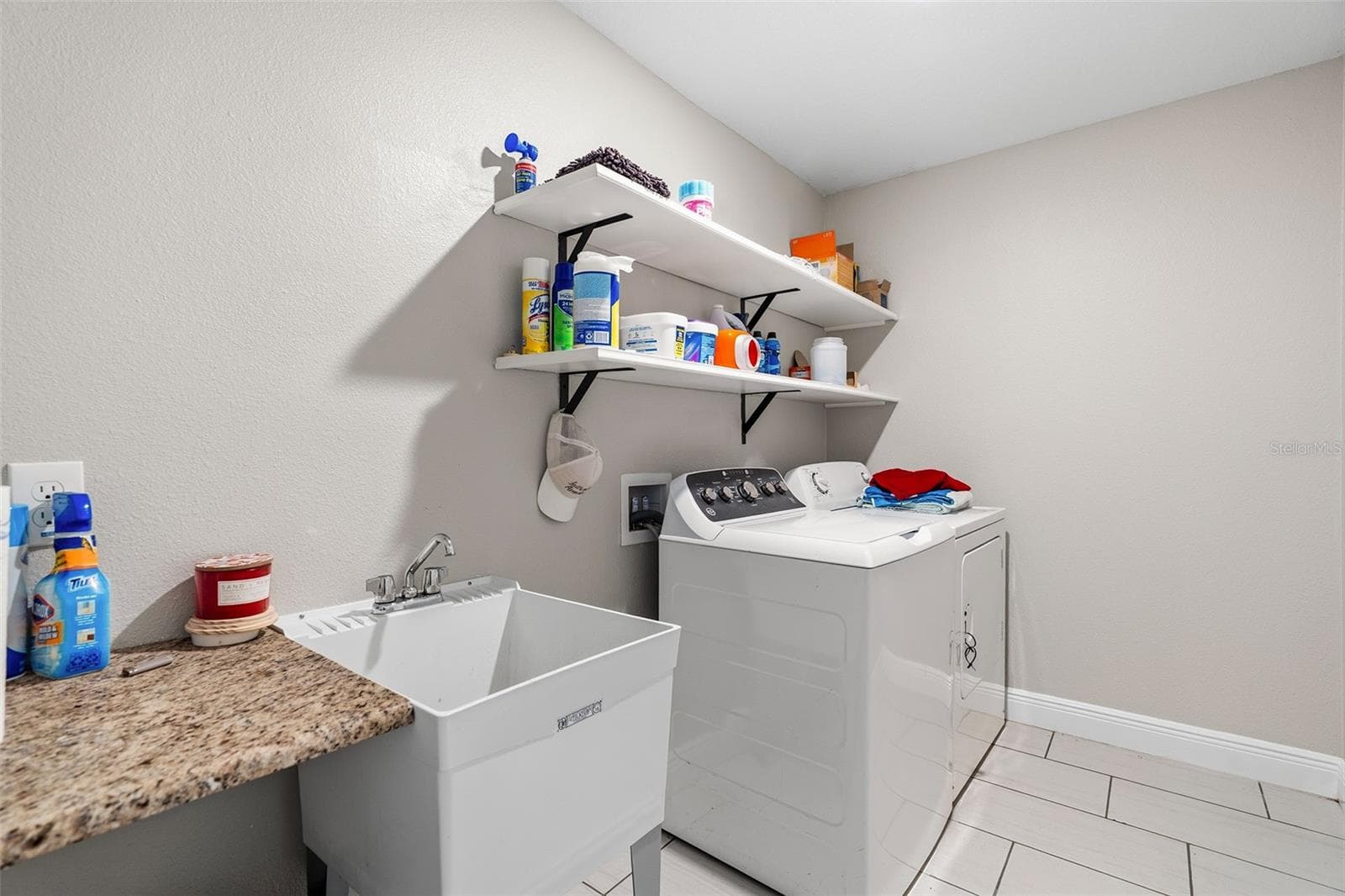 Upstairs Laundry Room with sink - 3481 MIDDLEBROOK PL, ST CLOUD
