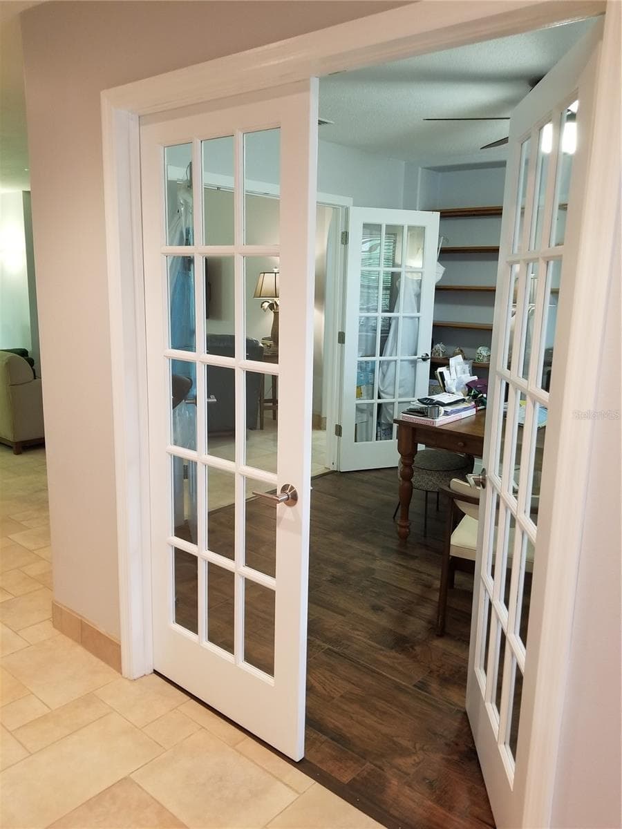 ONE OF TWO SETS OF FRENCH DOORS INTO THE OFFICE/LIBRARY - 1720 FOSSIL DR, ENGLEWOOD