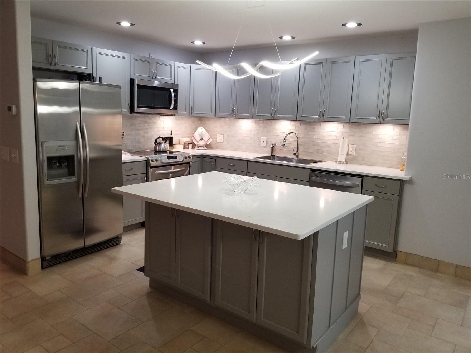 LARGE CUSTOM BUILT ISLAND WITH STORAGE ON 2 SIDES - 1720 FOSSIL DR, ENGLEWOOD