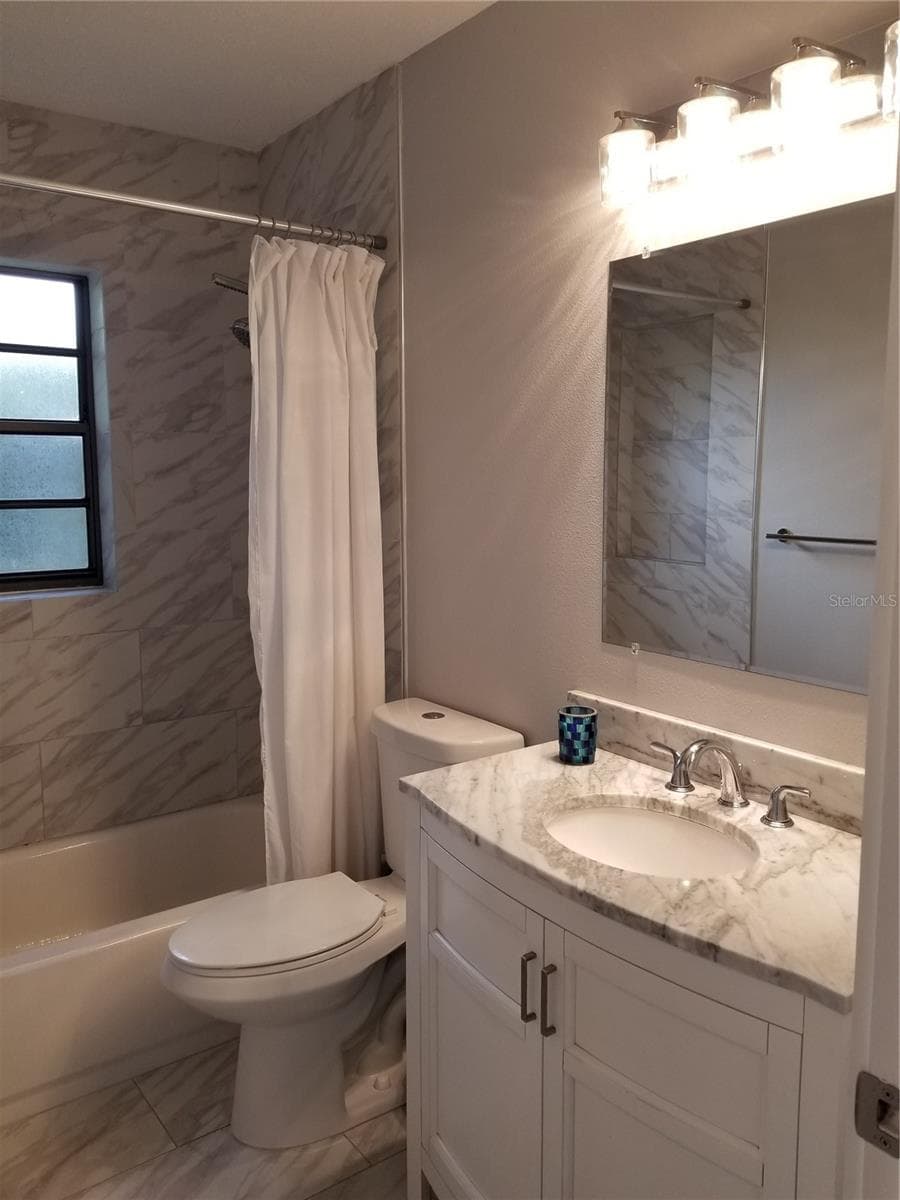 NEW VANITY AND TOILET - 1720 FOSSIL DR, ENGLEWOOD