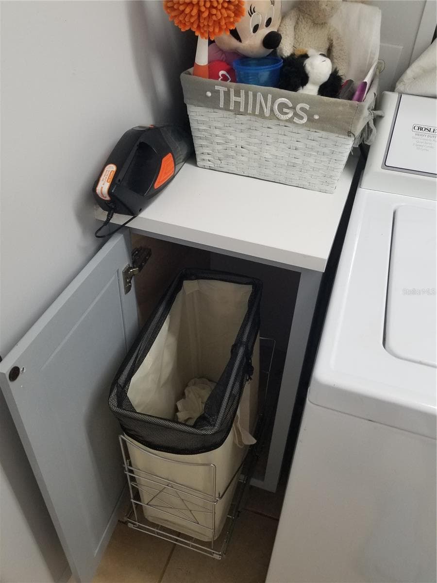PULL OUT HAMPER - 1720 FOSSIL DR, ENGLEWOOD