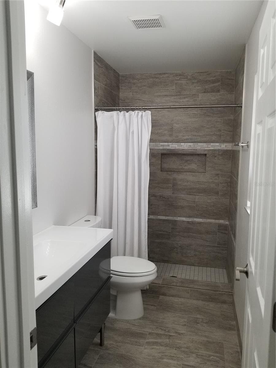 VIEW OF WALK IN SHOWER - 1720 FOSSIL DR, ENGLEWOOD