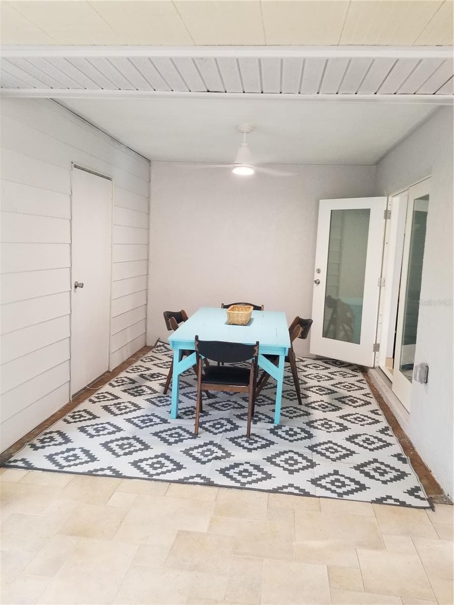 THE NOOK AS A DINING AREA, EL FRESCO WITH AN OUDOOR CEILING FAN WITH LIGHT - 1720 FOSSIL DR, ENGLEWOOD