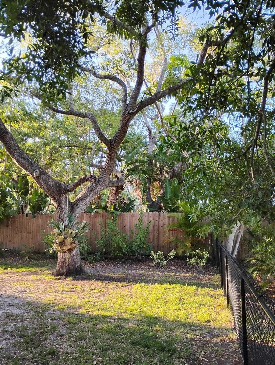 BEAUTIFULLY LANDSCAPED EASY TO MAINTAIN BACKYARD - 1720 FOSSIL DR, ENGLEWOOD