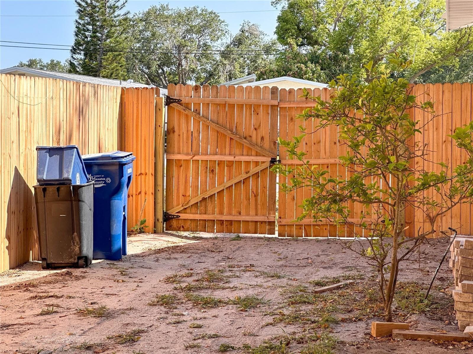 double gated entry large enough to fit an RV behind the gates ! - 5008 27TH AVE W, BRADENTON
