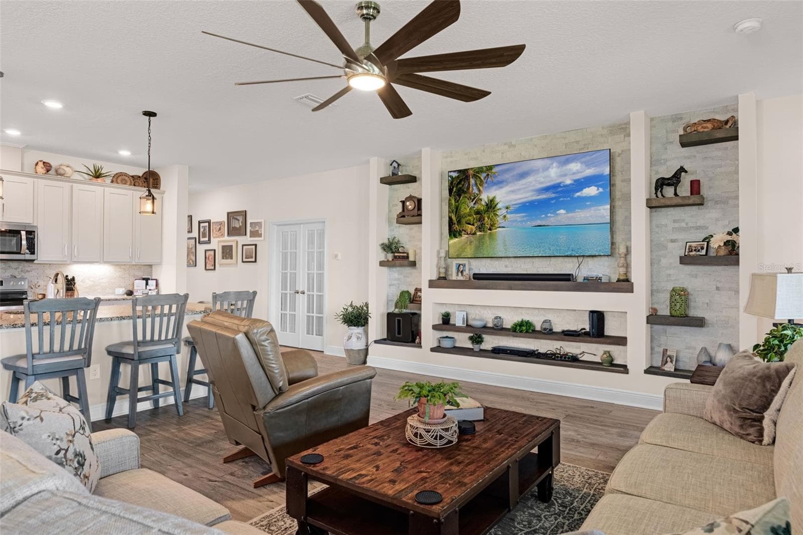 Great room/family room with feature wall - 5526 GAVELLA CV, PALMETTO