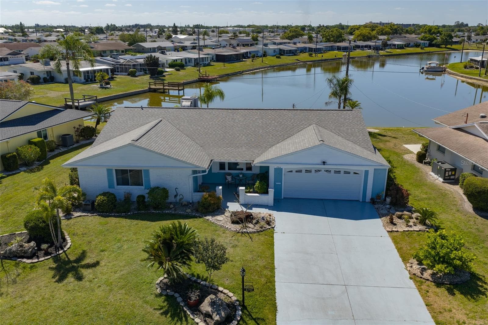 Low Aerial, Front View, Breathtaking South Lake View, Newer Roof - 1704 DANBURY DR, SUN CITY CENTER