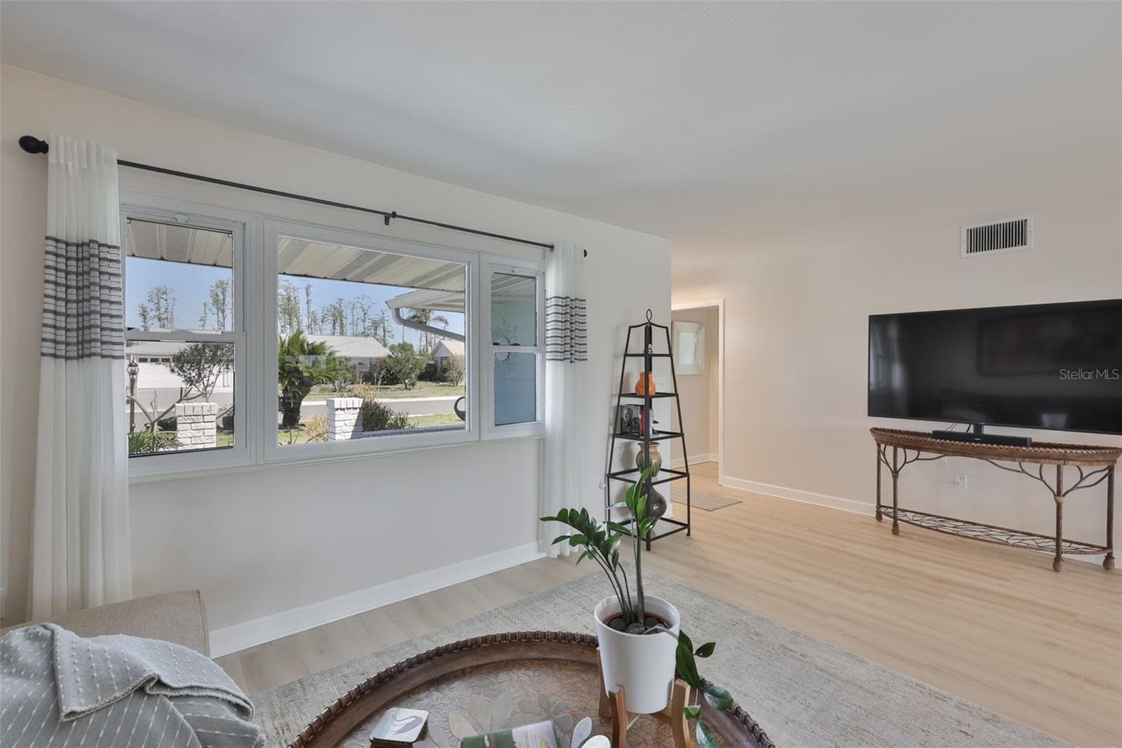 Front Entrance- 3 Bed/2 Bath Magnificent South Lake View, Modern LVT Plank Flooring, Newer Windows & Doors - 1704 DANBURY DR, SUN CITY CENTER