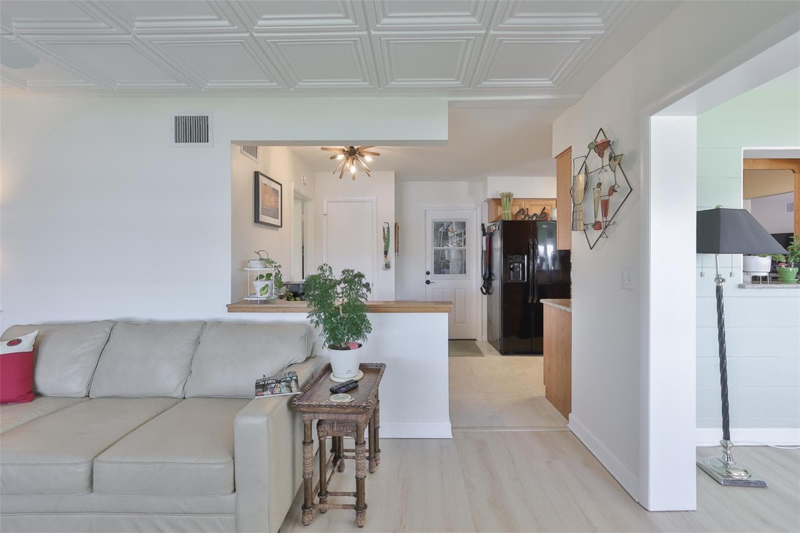 Great Room, Classic Elegance Coffered Ceiling, Ample Room for Entertaining, Bright & Cheerful - 1704 DANBURY DR, SUN CITY CENTER