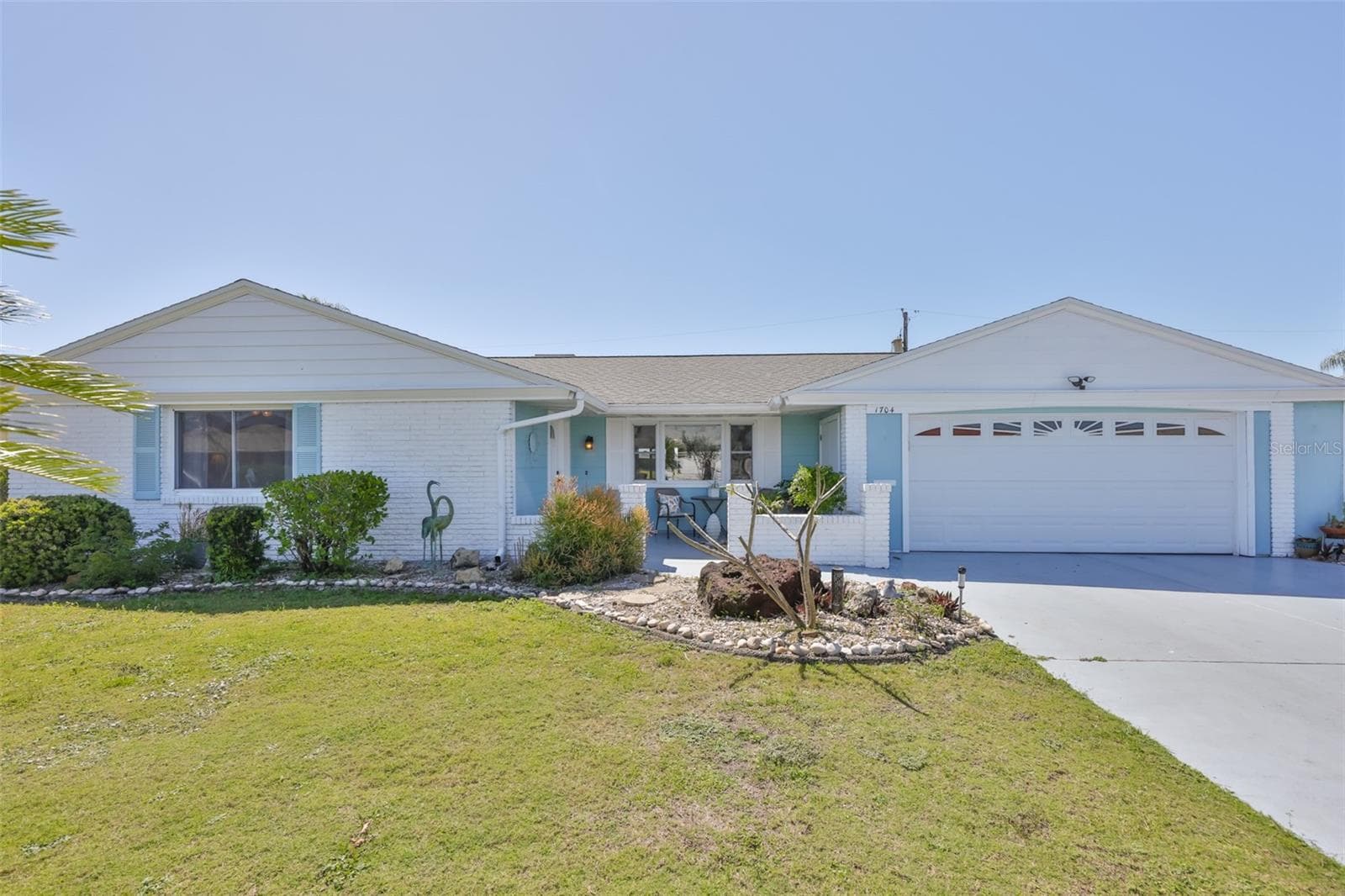 Exterior Front, 2-Tone Exterior Color Scheme-Pleasant Beachy Vibe - 1704 DANBURY DR, SUN CITY CENTER