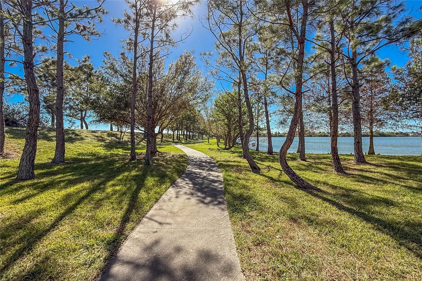 Walking path around lake - 8834 TUSCANY ISLES DR, PUNTA GORDA