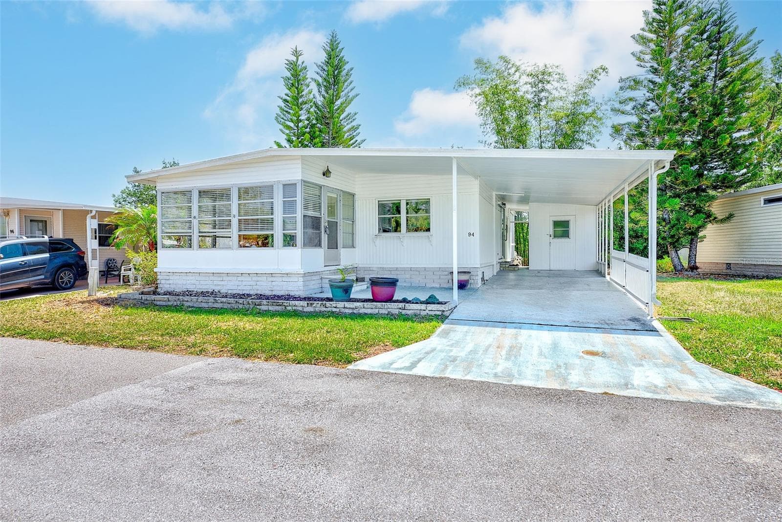 Manufactured Home at 94 SUGAR BEAR DR #55, SAFETY HARBOR, photo 3 of 43