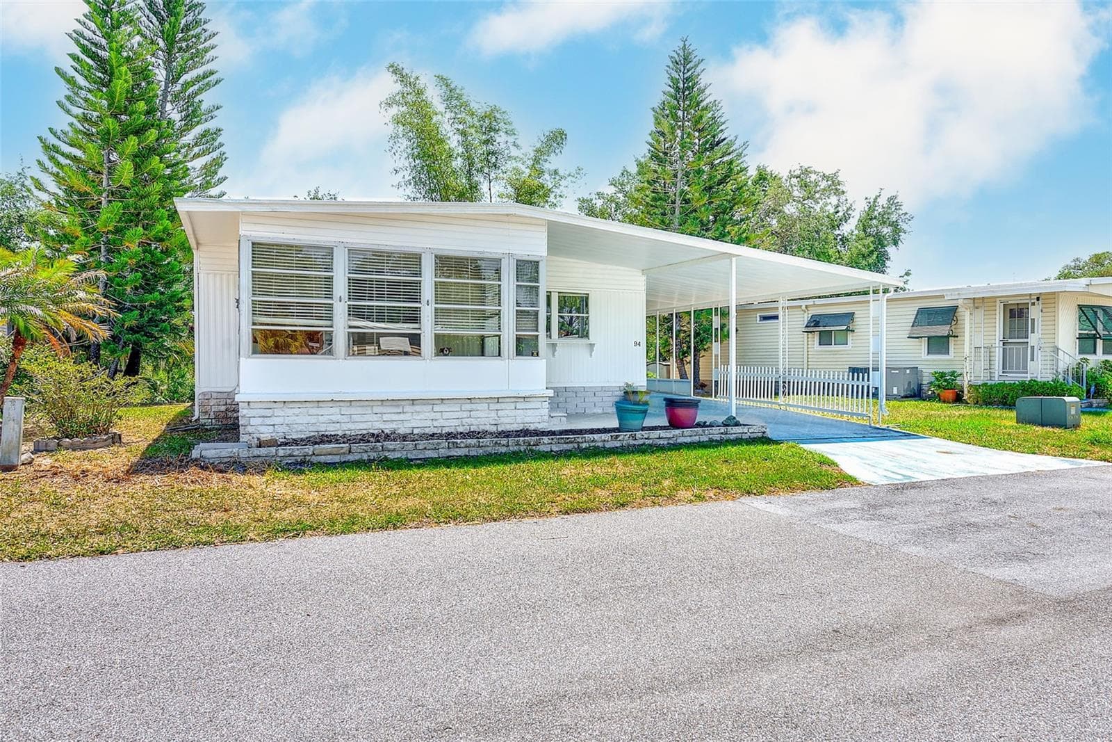 Manufactured Home at 94 SUGAR BEAR DR #55, SAFETY HARBOR, photo 2 of 43