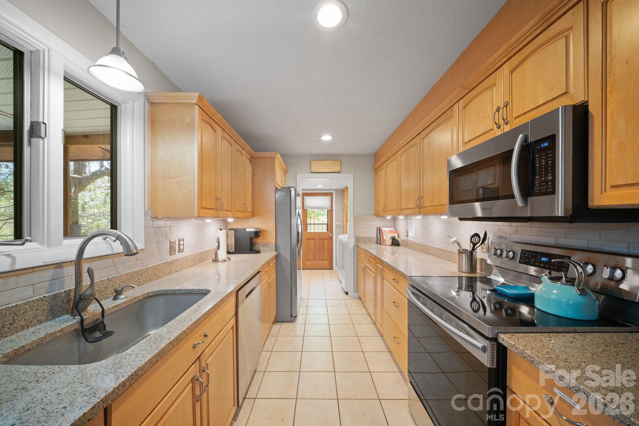 Kitchen with laundry room attached - 363 S Sequoyah Lane, Brevard