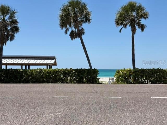 Private entrance for residents of Longboat Key Estates just across Gulf of Mexico Drive. Community gazebo is to the left. - 581 ROUNTREE DR, LONGBOAT KEY